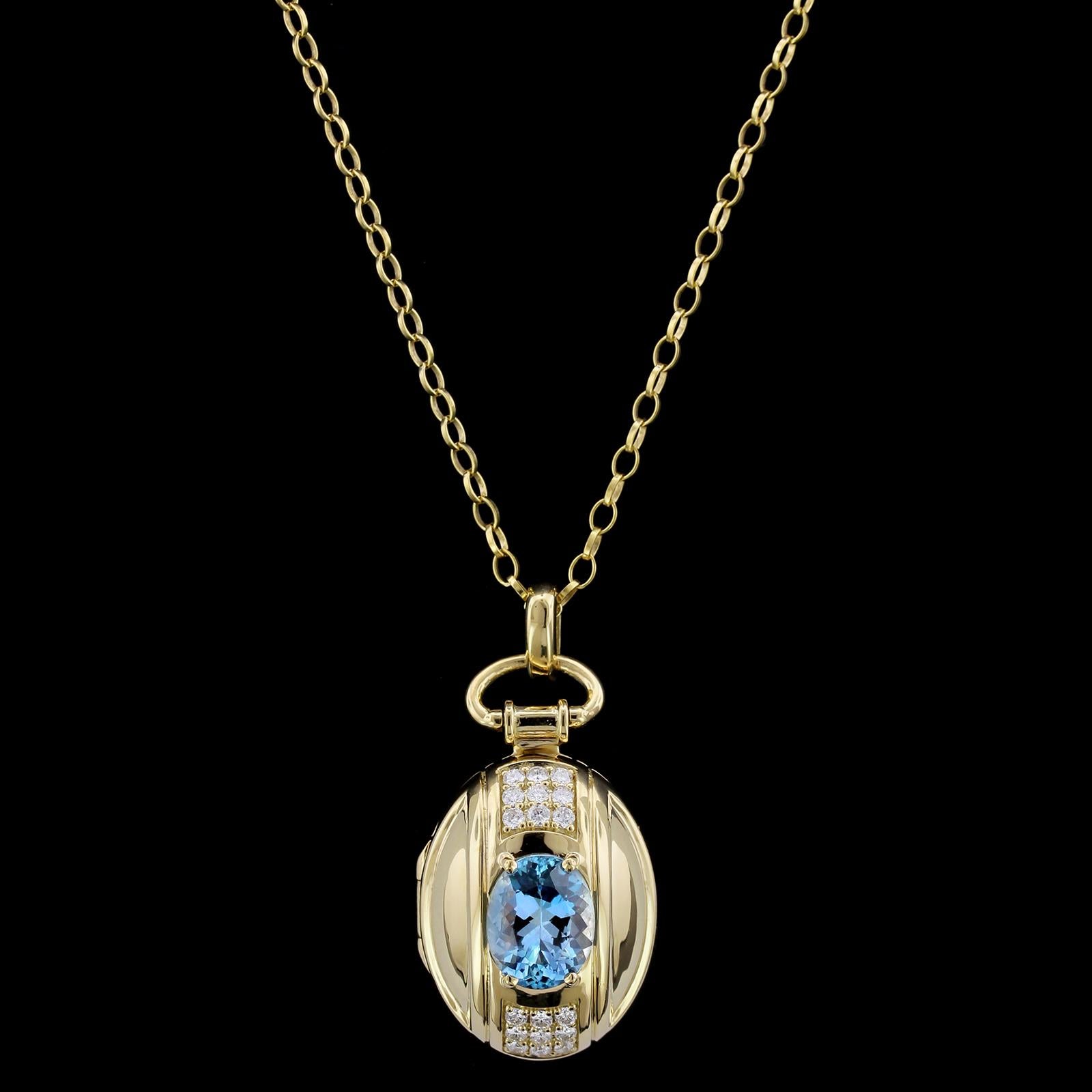 Monica Rich Kosann 18K Yellow Gold Aquamarine and Diamond Locket. The locket is
set with an oval cut aquamarine weighing approx. 3.30cts., further set with full
cut diamonds, approx. total wt. .45cts., G color, VS clarity, suspended from a 26