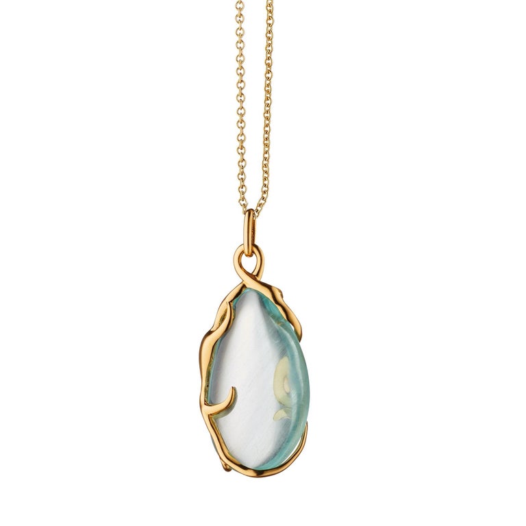 This Monica Rich Kosann 18K Yellow Gold Octopus pendent highlights the clever, highly intelligent, and creative intuitive creatures. The octopus is wrapped around an included Aquamarine stone which is known to calm and soothe.
Presented on a 22”