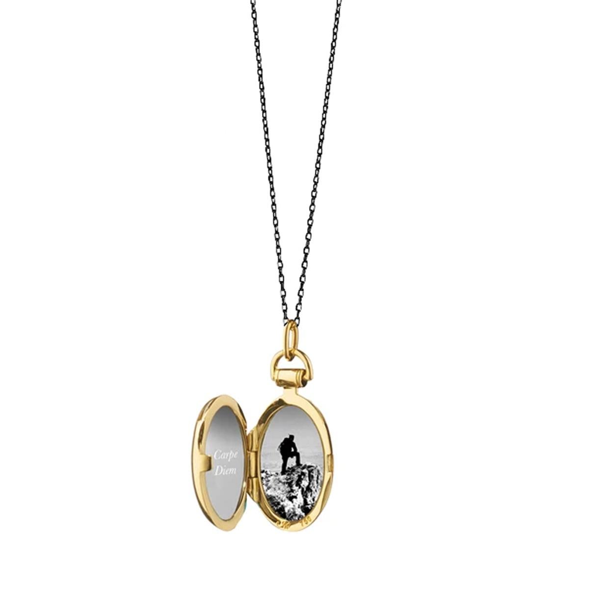 18k yellow gold Anna Locket that holds two photos with a 17-inch black steel chain. 

Change your photos as often as you like using the template on the MRK website:


