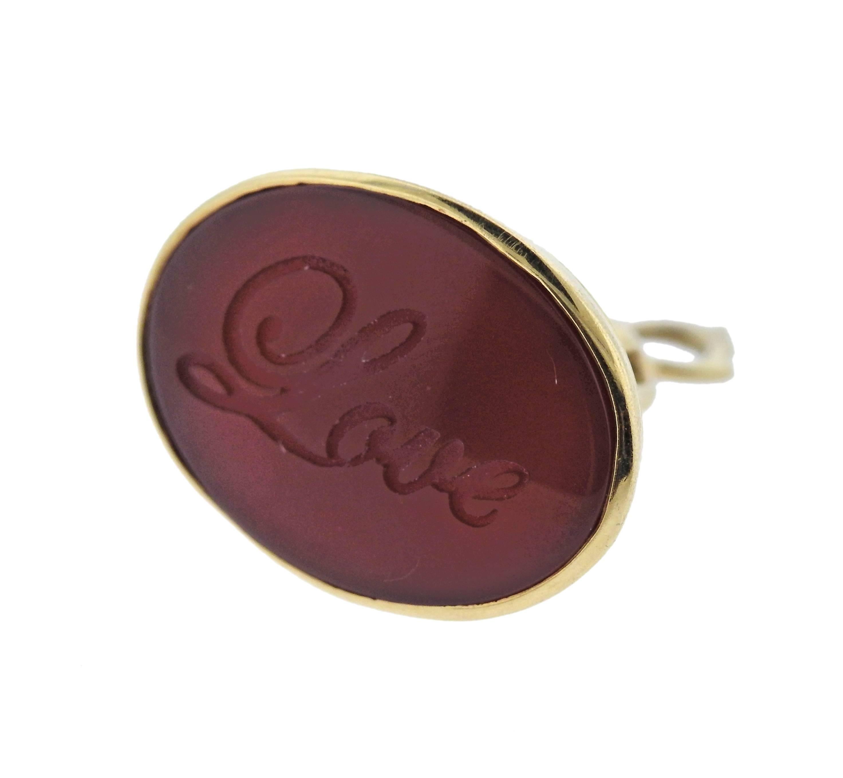 18k yellow gold fob pendant, crafted by Monica Rich Kosann, featuring carnelian intaglio,  reading 