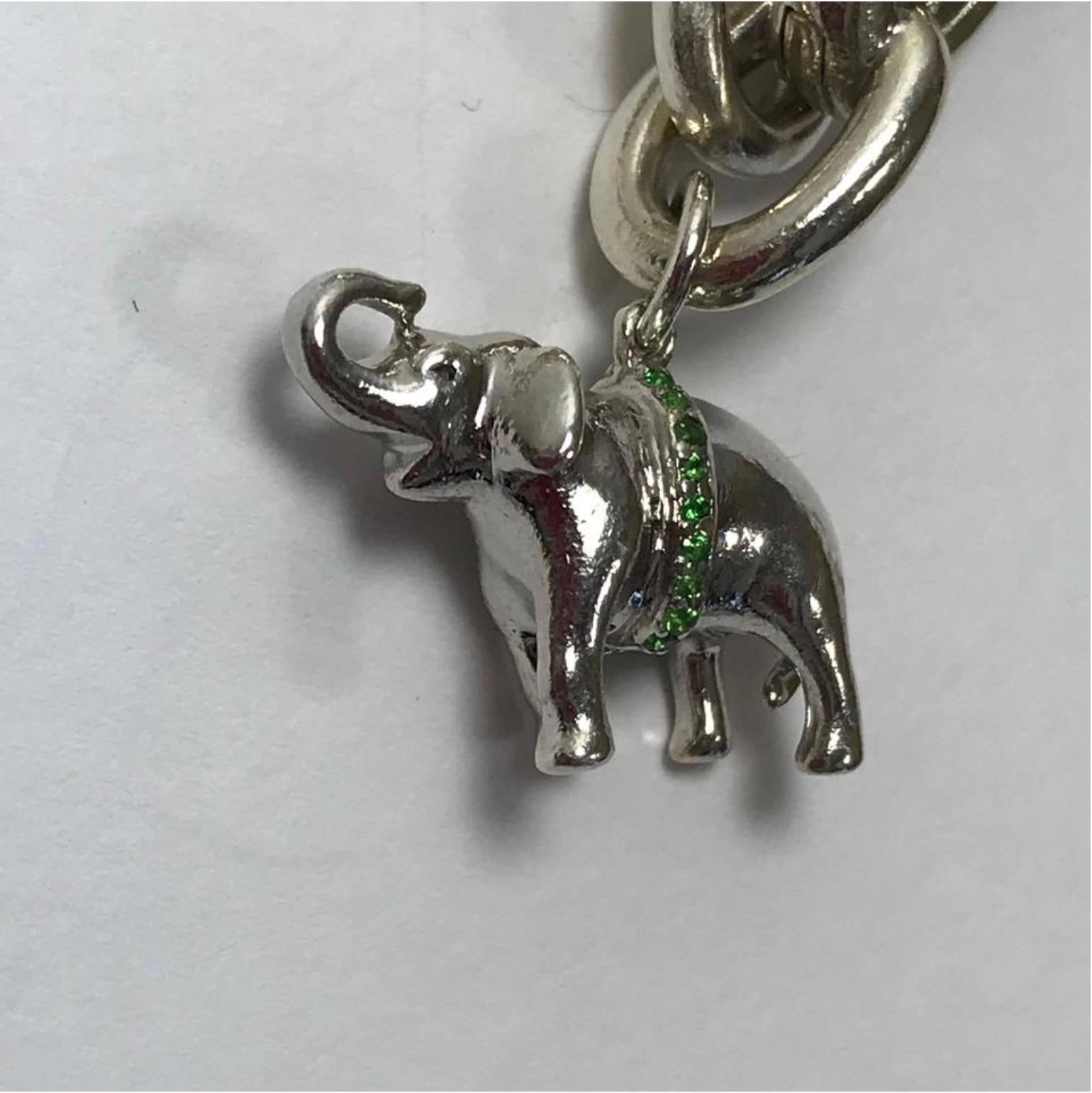 MODEL - Monica Rich Kosann Luck Elephant with Green Tsavorite Charm ONLY

CONDITION - Exceptional!  - No signs of wear.

SKU - 928.7

ORIGINAL RETAIL PRICE - 235 + tax

DIMENSIONS - L.75 x H.6 x W.3

MATERIAL - Sterling Silver with Green