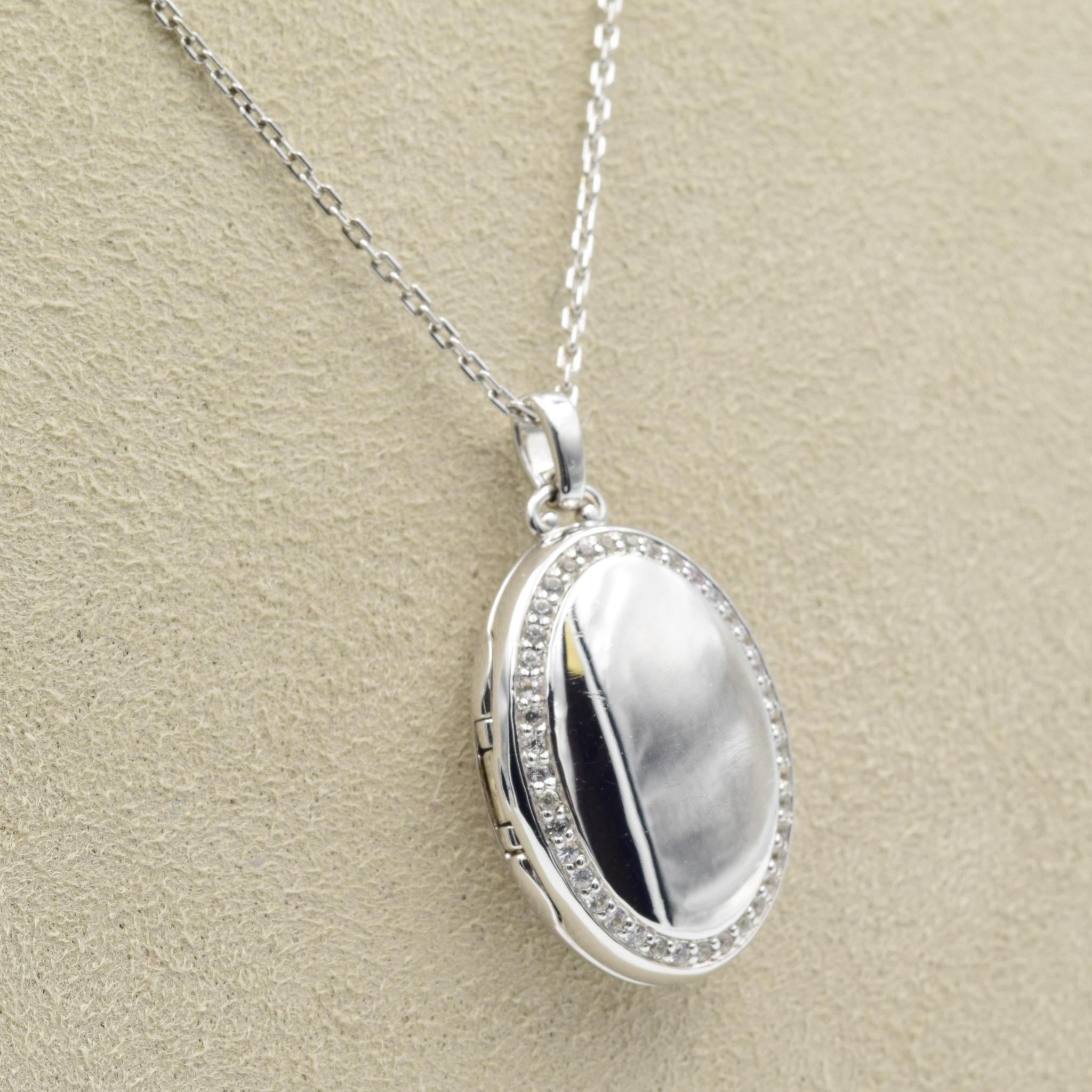 Sterling Silver
Set with White Sapphires
32