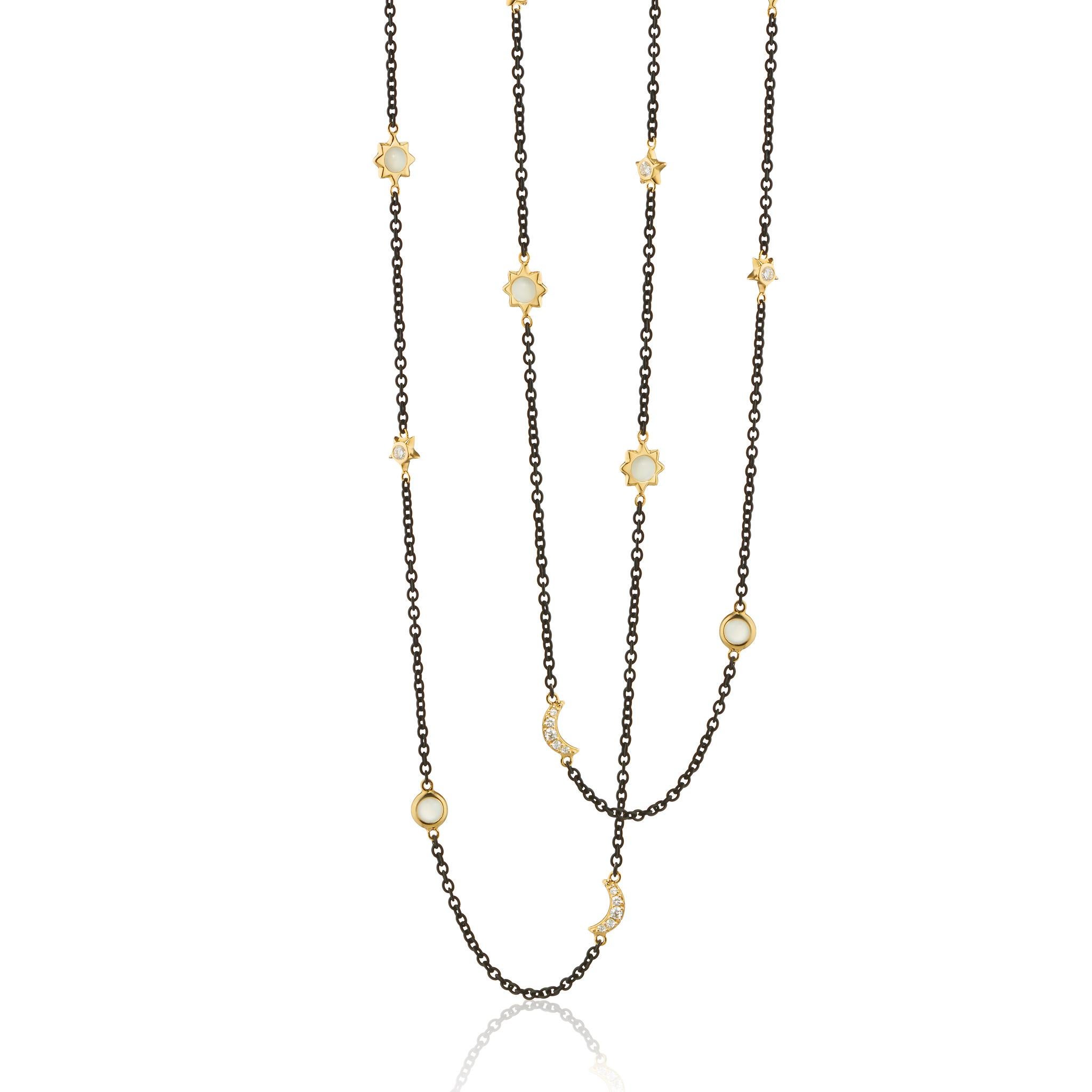 From the Sun, Moon and Stars Collection, this black steel chain necklace inspires the mystical quality of space by featuring (5) each of the following accents in 18K yellow gold - diamond moons, bezel set moonstone suns and bezel set diamond stars.