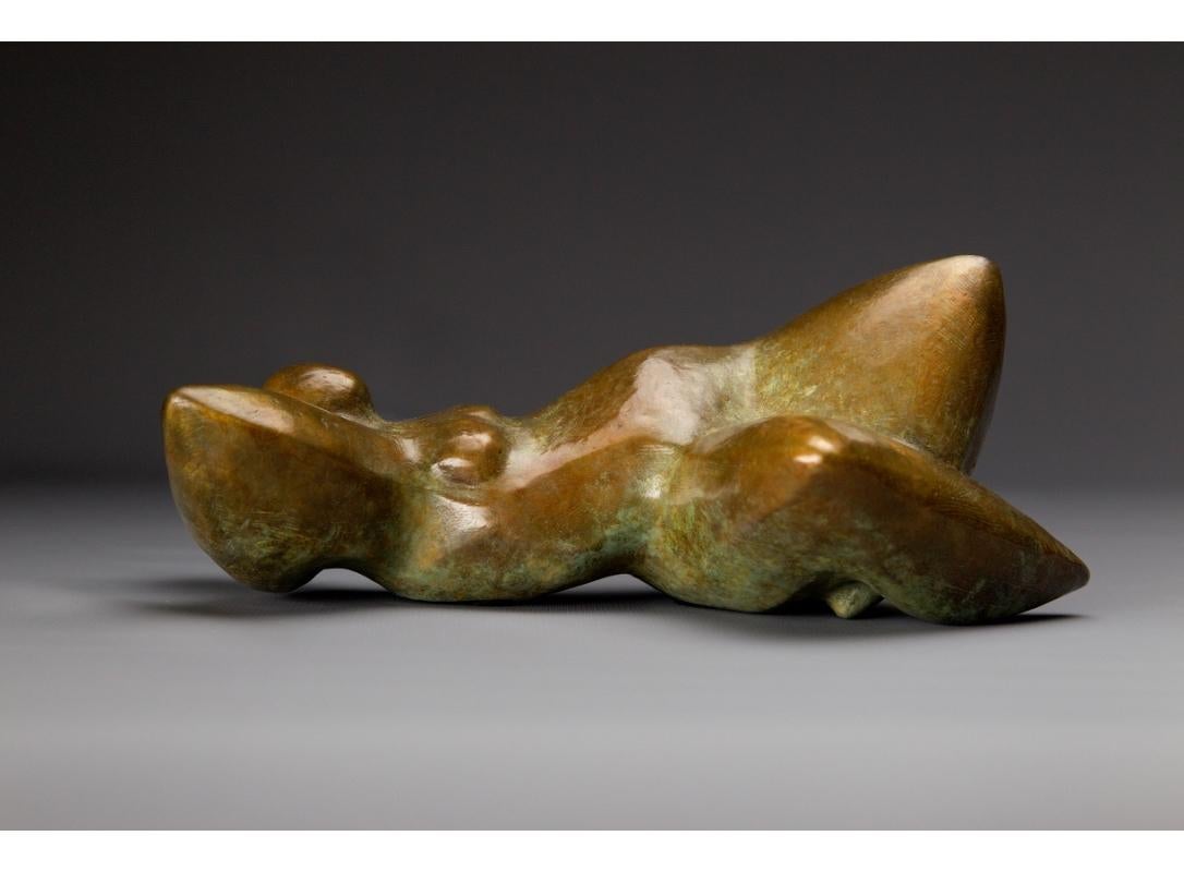 "Good Morning" Bronze sculpture of a woman lying back with arms behind her head