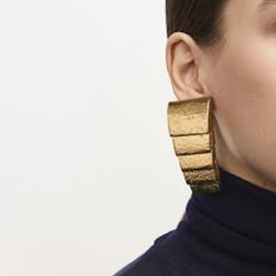 Graduated acacia wood clip earrings from Monies. 