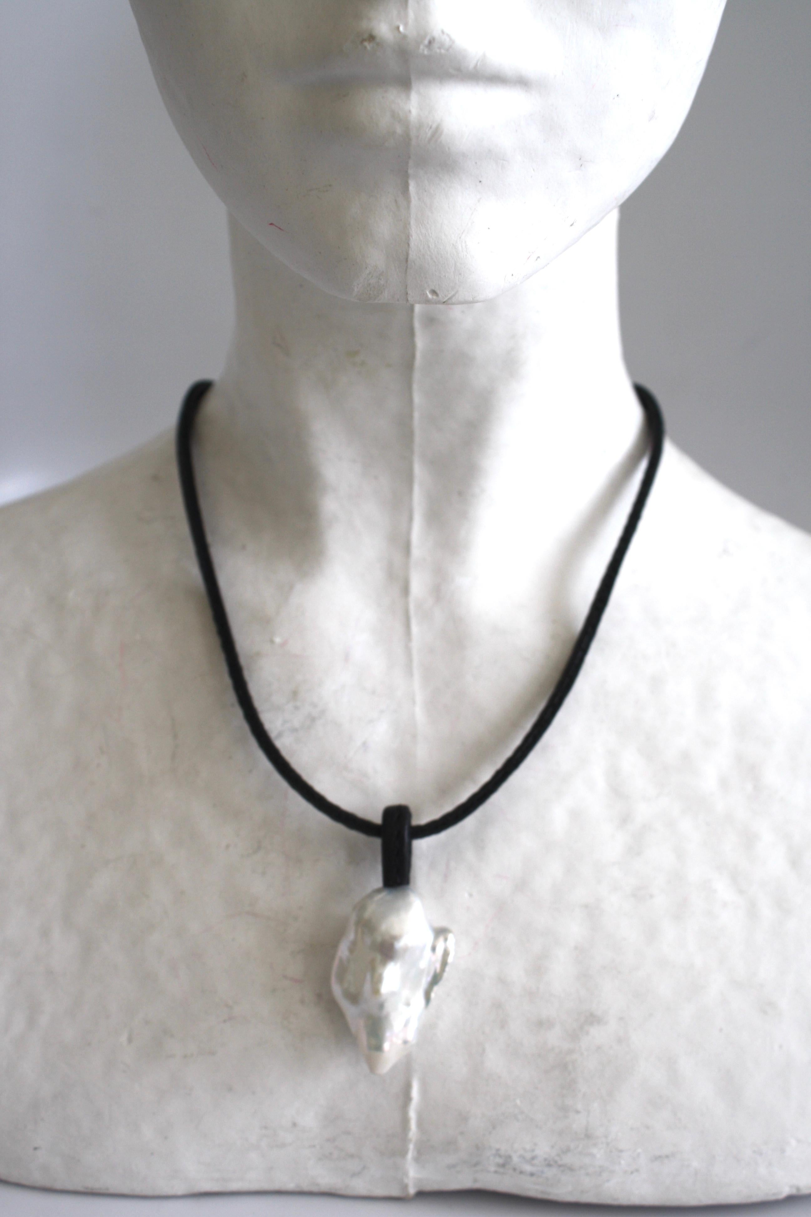 Leather strand with baroque pearl pendant from Monies.  Pearl is 1.5