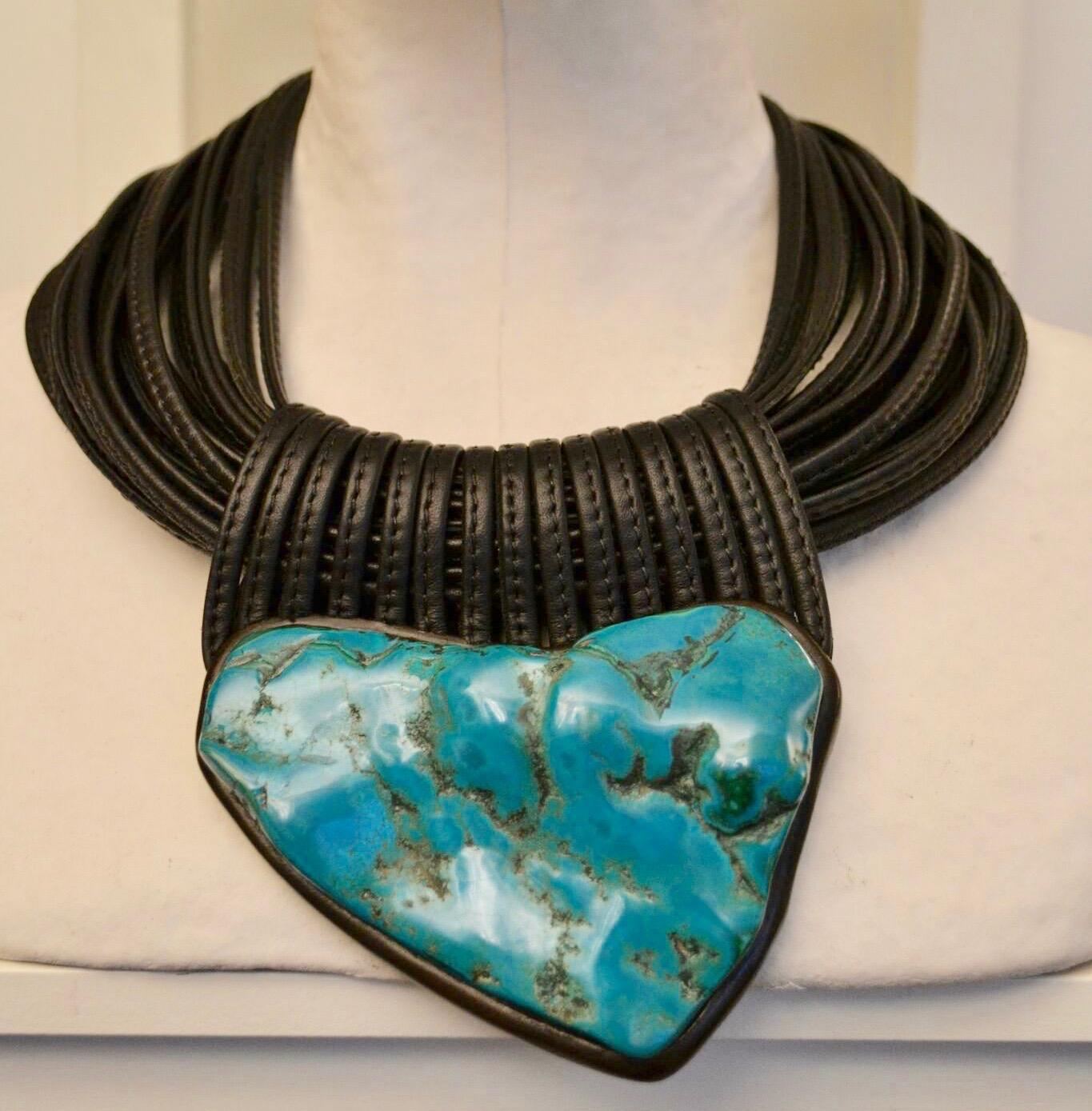 Monies necklace made with chrysocolla stone, ebony, and leather. One of a kind.
Stone is 4”x2.5”