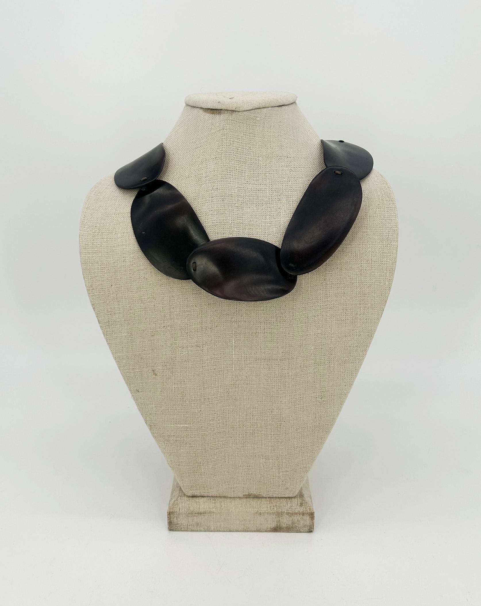Monies Dark Brown Black Natural Resin Bead Leather Choker Necklace in very good condition. One scratch on the back of one bead- please see photos, cannot be seen when worn. Leather loop and bead clasp. Measurements: 22