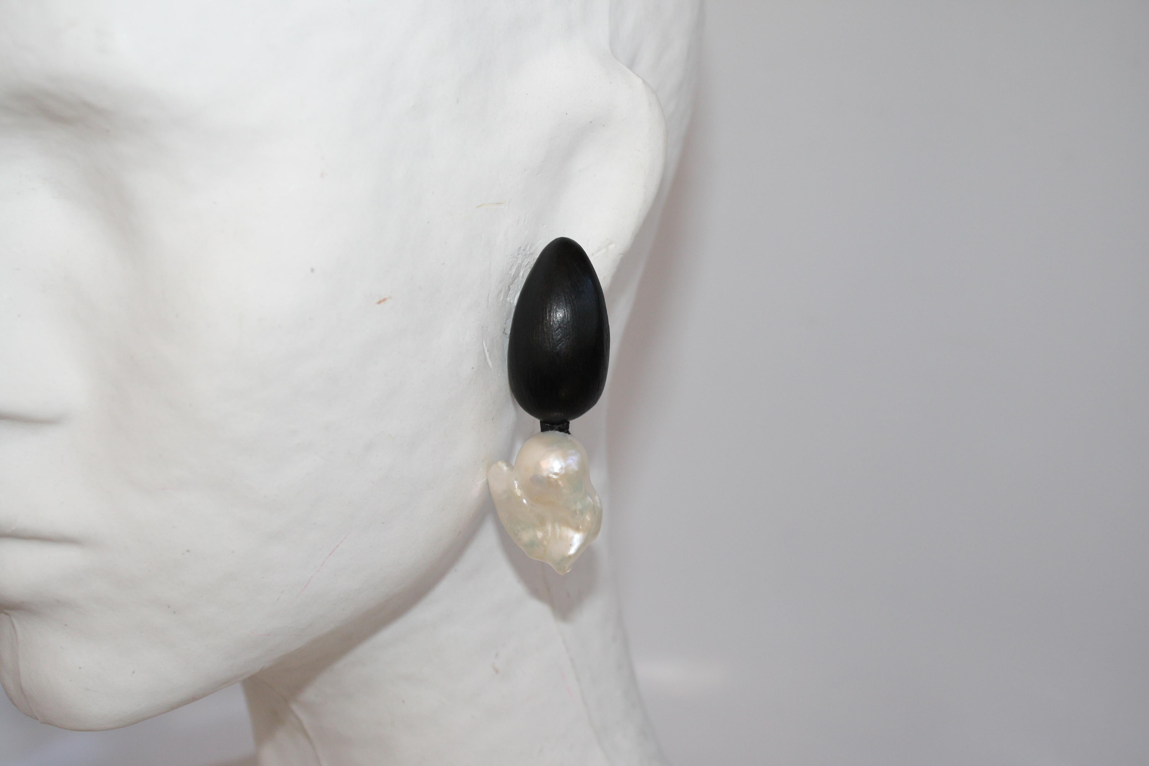 Freshwater baroque pearl drop clip earrings with ebony clip top from Monies Denmark. 