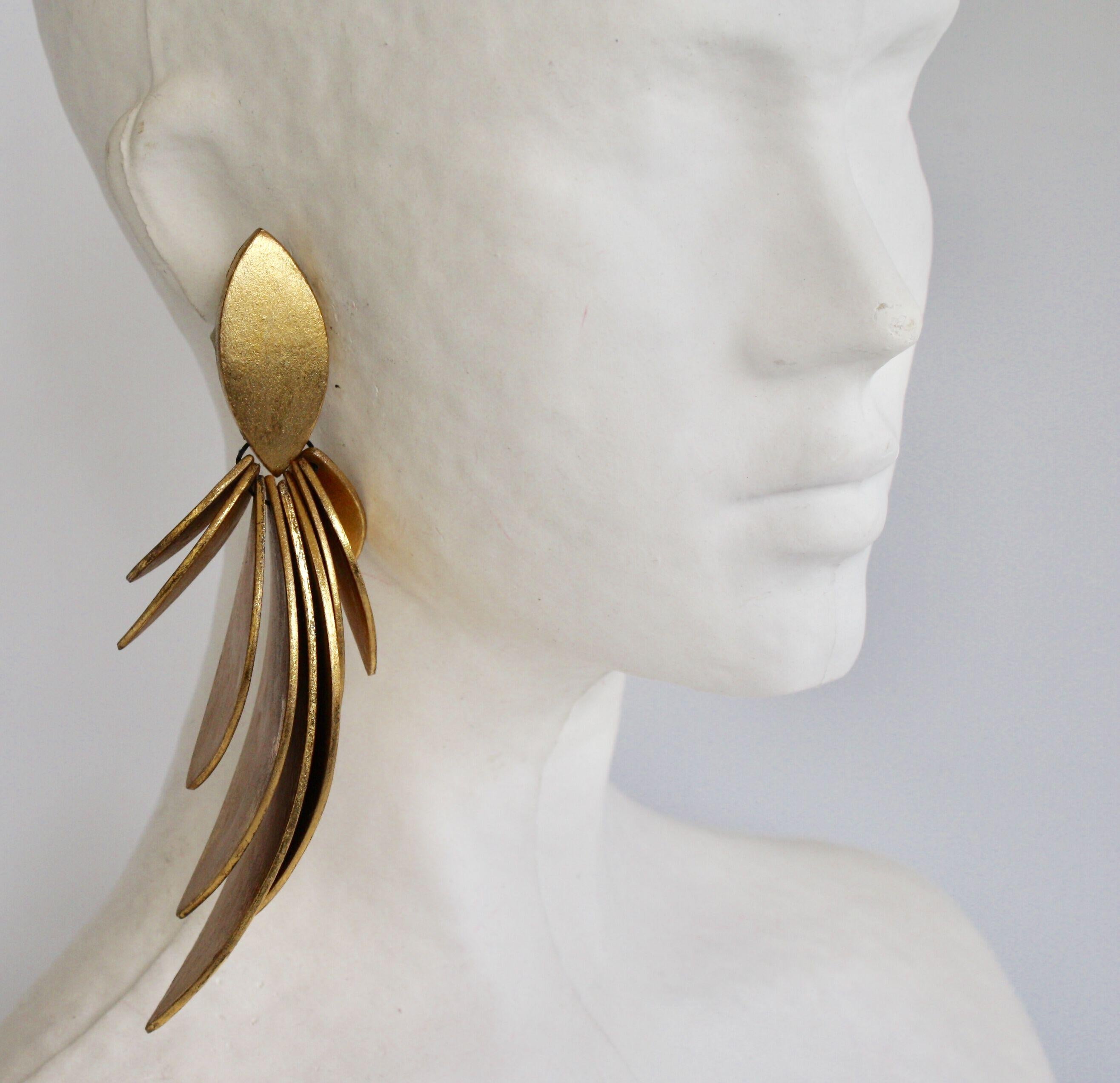 Feather inspired gold leaf and ebony wood clip earrings from Monies. Very lightweight despite the bold look. 
