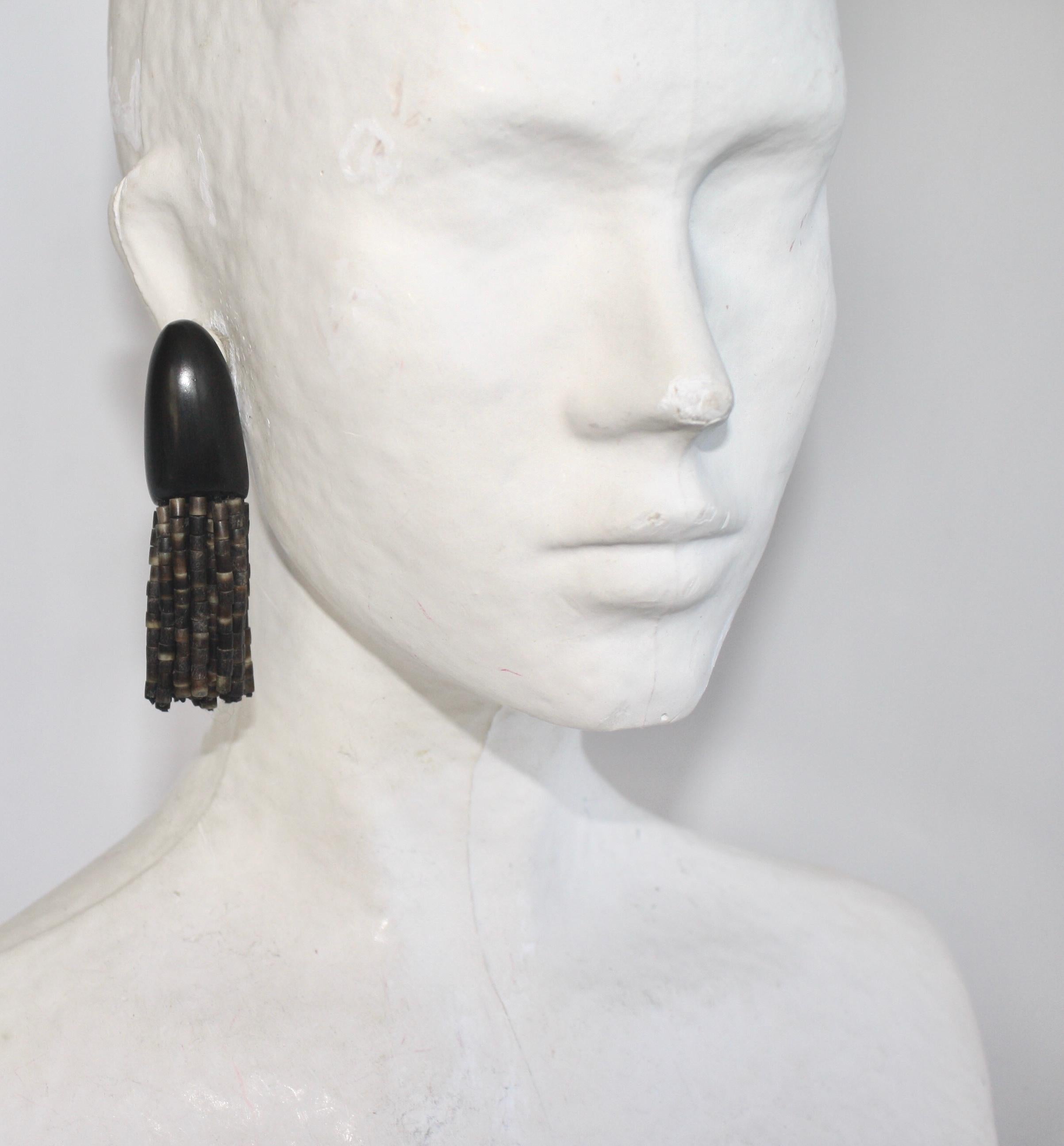 Kamagong wood and horn tassel clip earrings from Monies. 