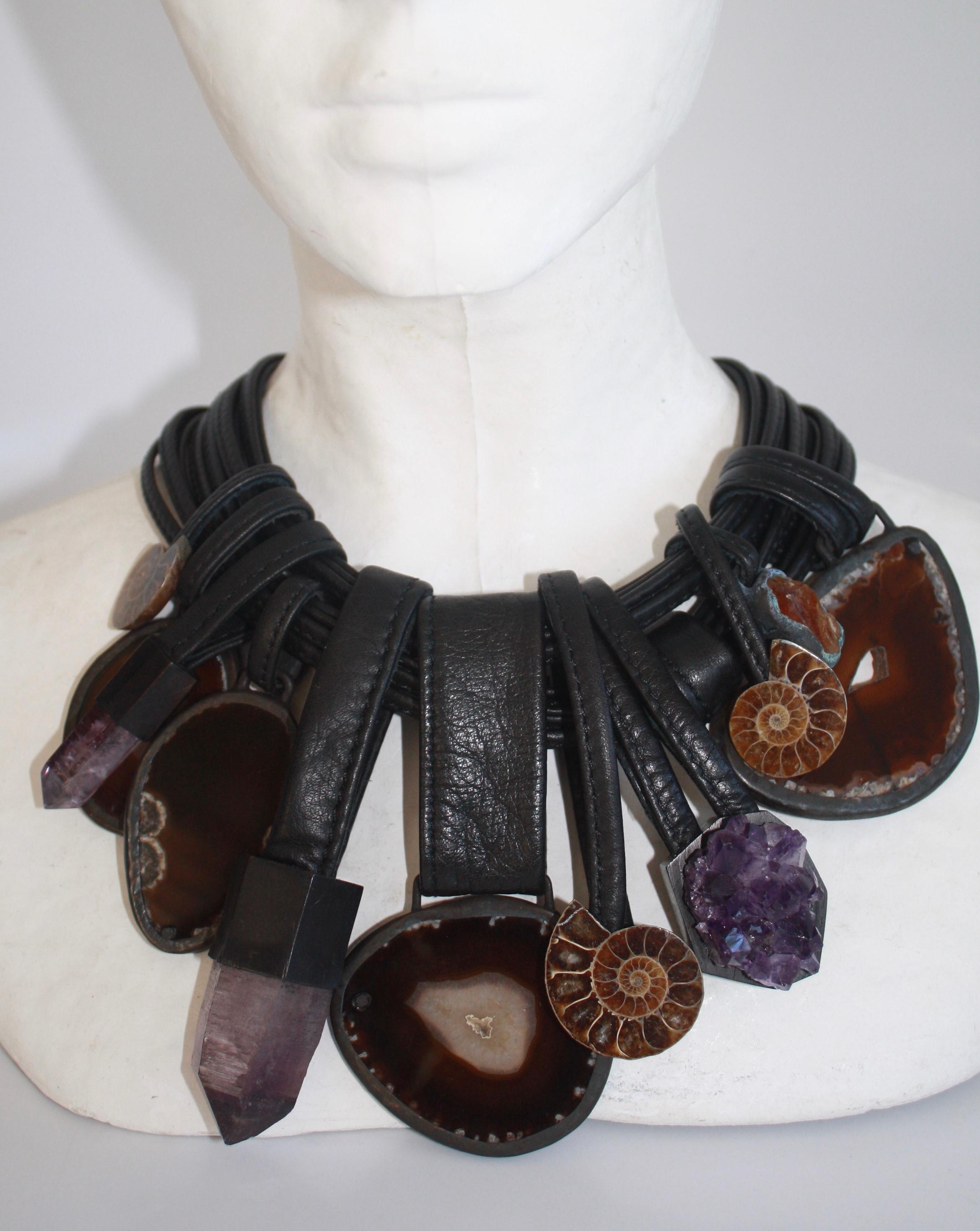 Monies One of a Kind Agate, Amethyst, Ammonite, Leather, & Acacia Wood Necklace. Longest piece is 4”.