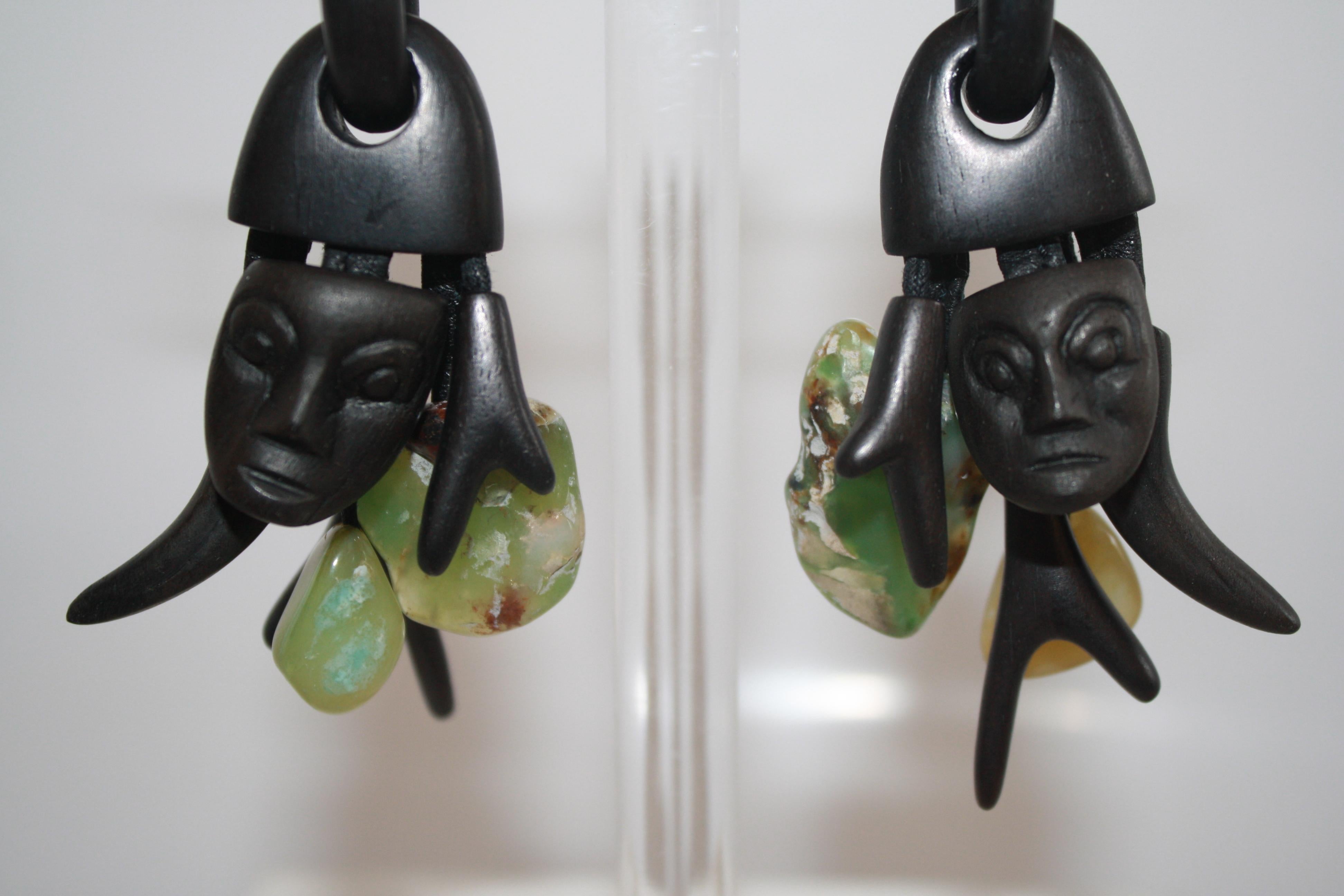 Hand carved ebony wood clip earrings with Chrysoprase stones throughout from Monies, Denmark. 