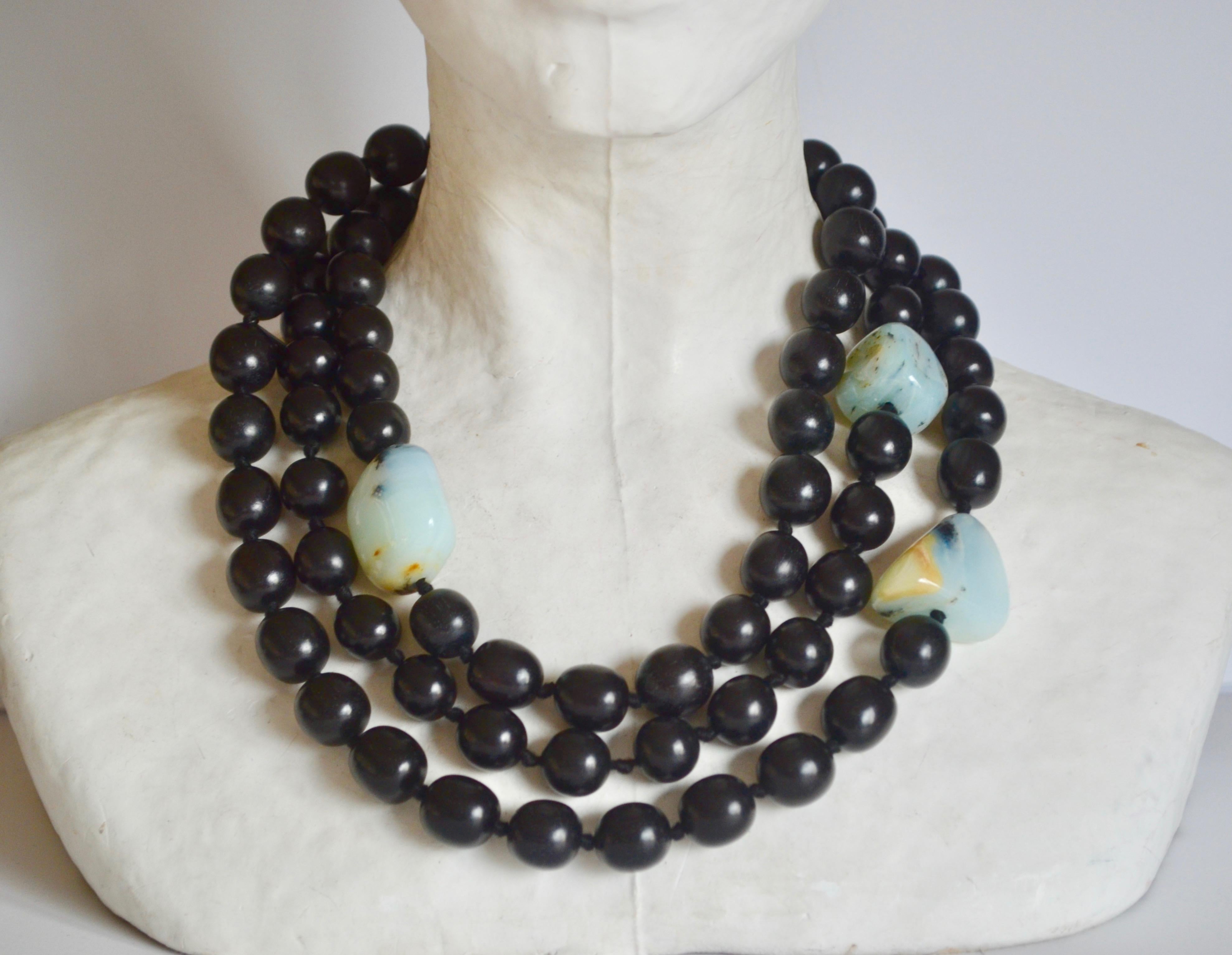 One of a kind wood bead necklace with blue peruvian opal stones from Monies Denmark.