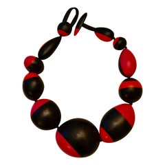 Collier en polyester rose:: orange et noir Monies