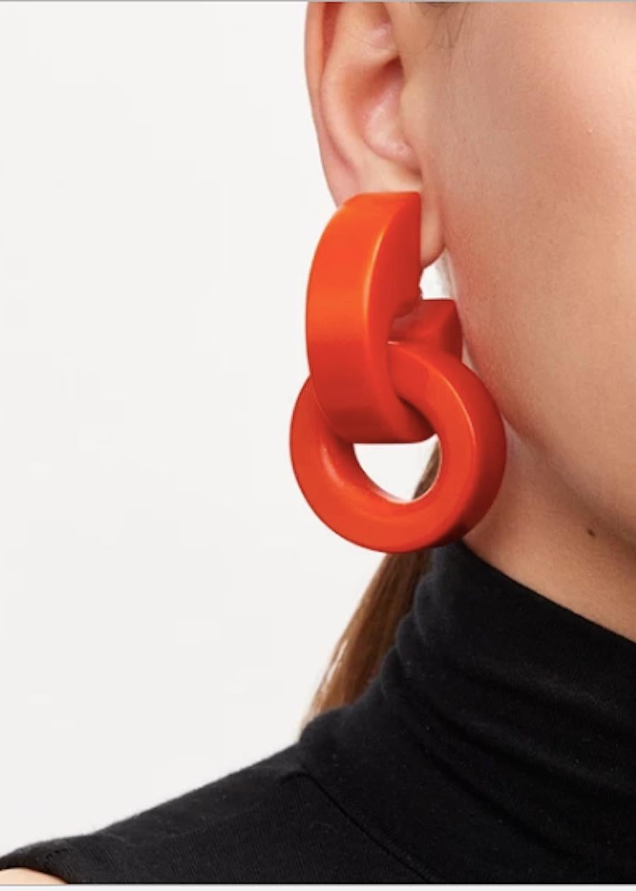 Red rose polyester lightweight clip earrings from Monies Denmark. 