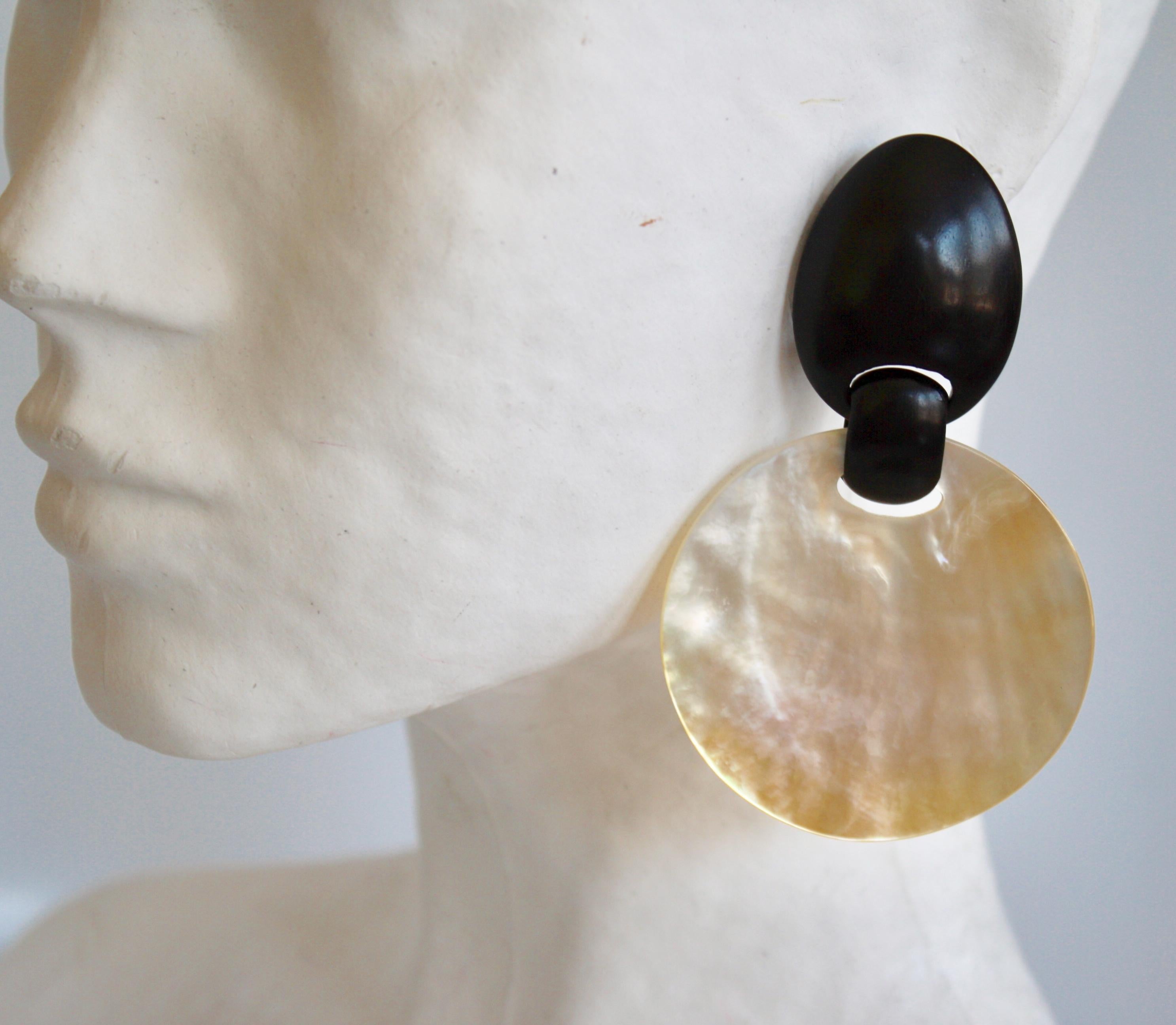 Round shell disc clip earrings with ebony wood top from Monies Denmark. 