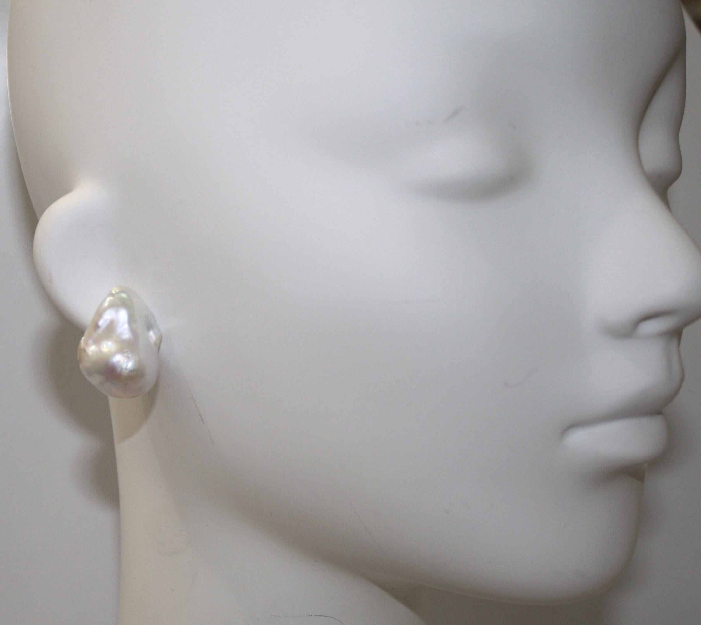 Beautifully paired pearls with silver back clip