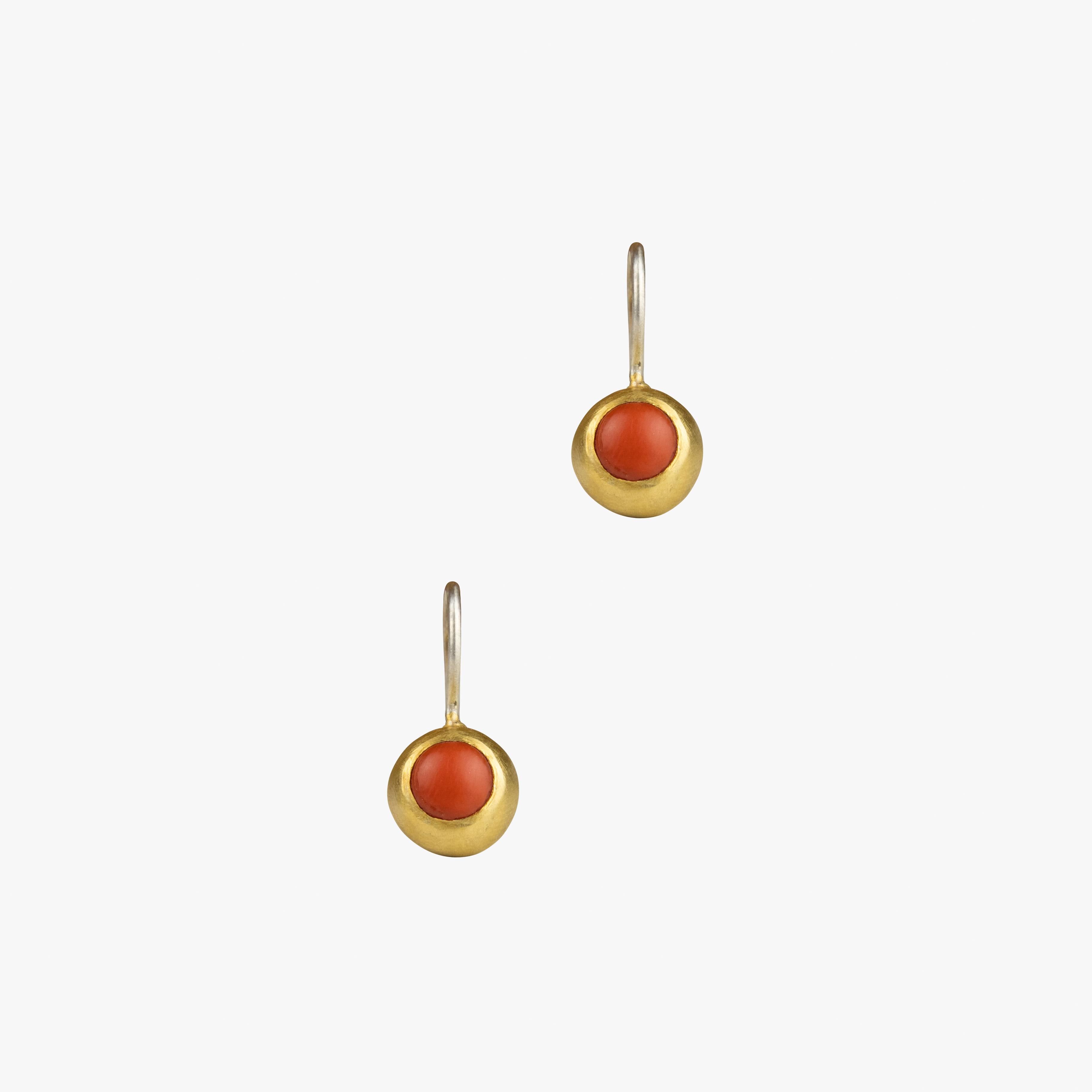 The gold plated Coral Earrings made from Sterling Silver are part of the Coral Classics and symbolize the vibrant and high quality designs of Monika Herré.

 

The curved earring splint smoothly glides around the ear and is worked into the matt gold