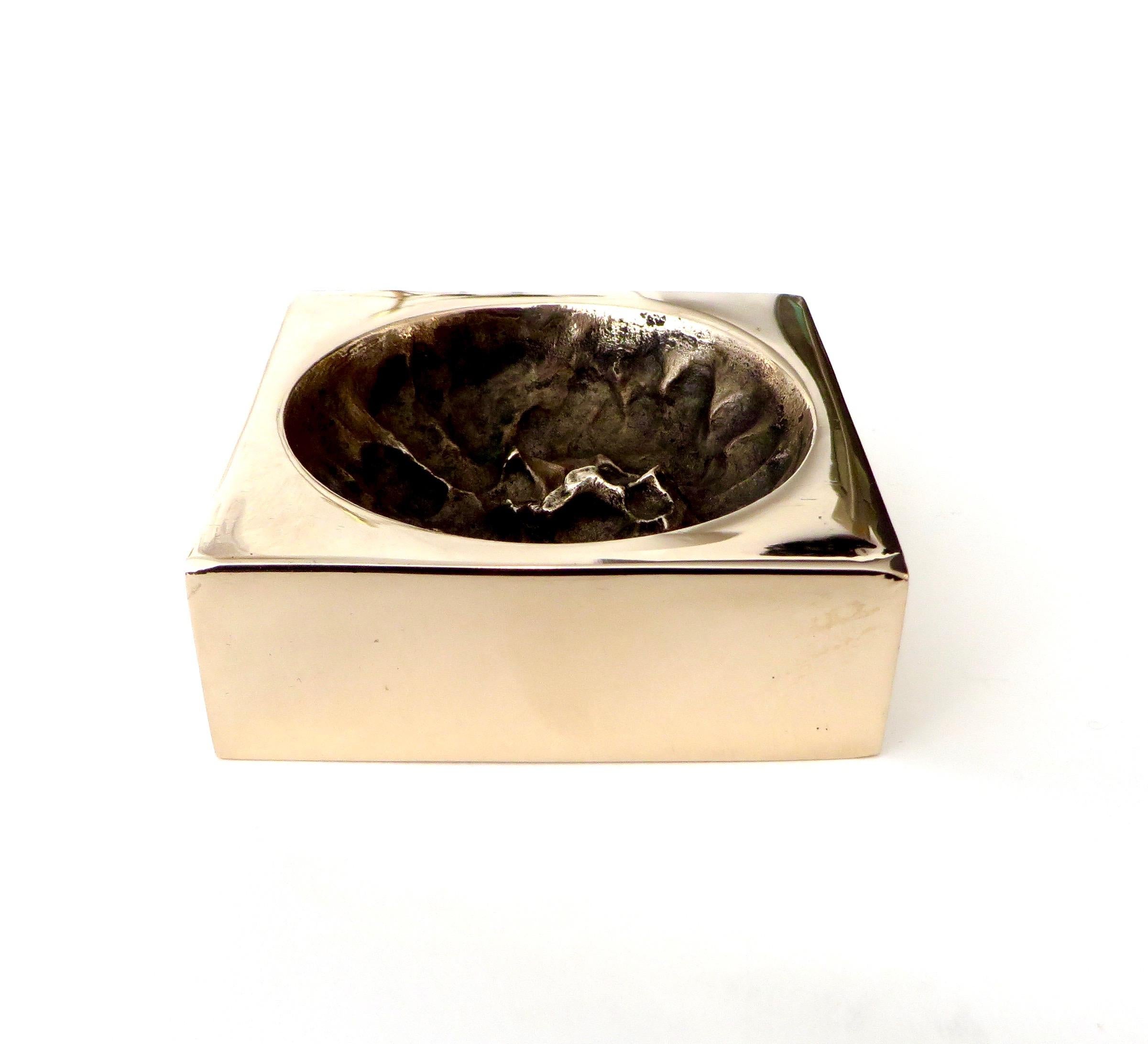 A bronze vide poche, paperweight or decorative dish by French artist Monique Gerber with sculptural brutalist interior.
Signed MG France.