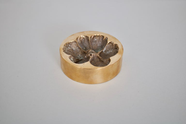A bronze vide poche or decorative dish by French artist Monique Gerber in the motif of a large petal Marguerite or daisy.
Signed MG.

