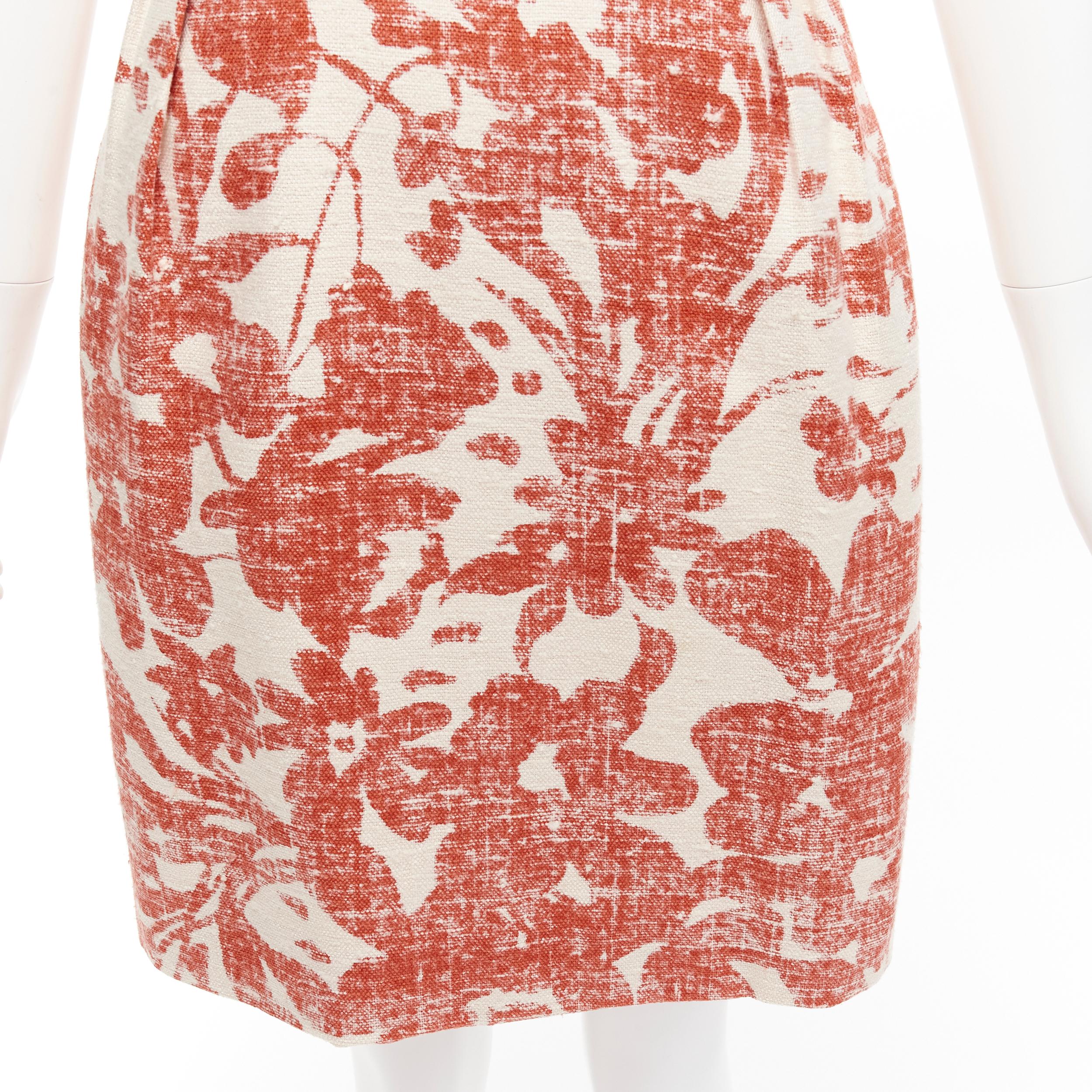 MONIQUE LHUILLIER vestido de novia con cuello adornado con flores en color crema y rojo en venta 1