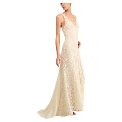 Used Monique Lhuillier ivory lace plunging backless wedding gown with train dress 