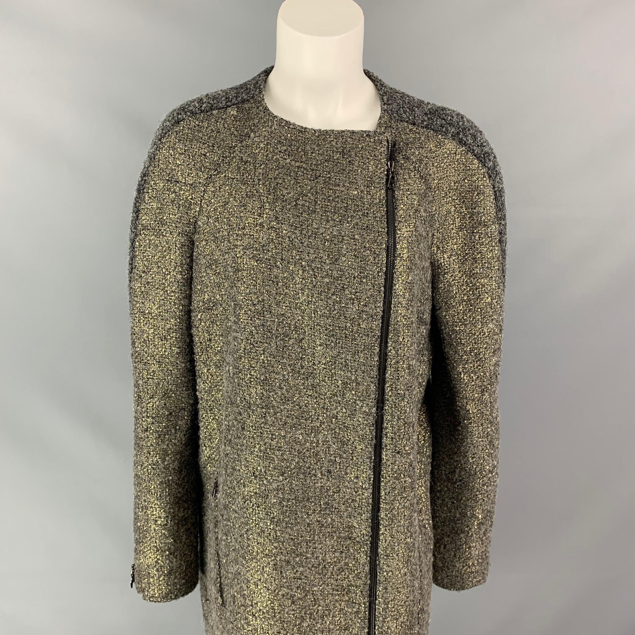 MONIQUE LHUILLIER coat comes in a grey & gold acrylic blend with a full liner featuring a collarless style, zipper pockets, and a full zip up closure. Made in USA.
Very Good
Pre-Owned Condition. 

Marked:  10 

Measurements: 
 
Shoulder: 17 inches