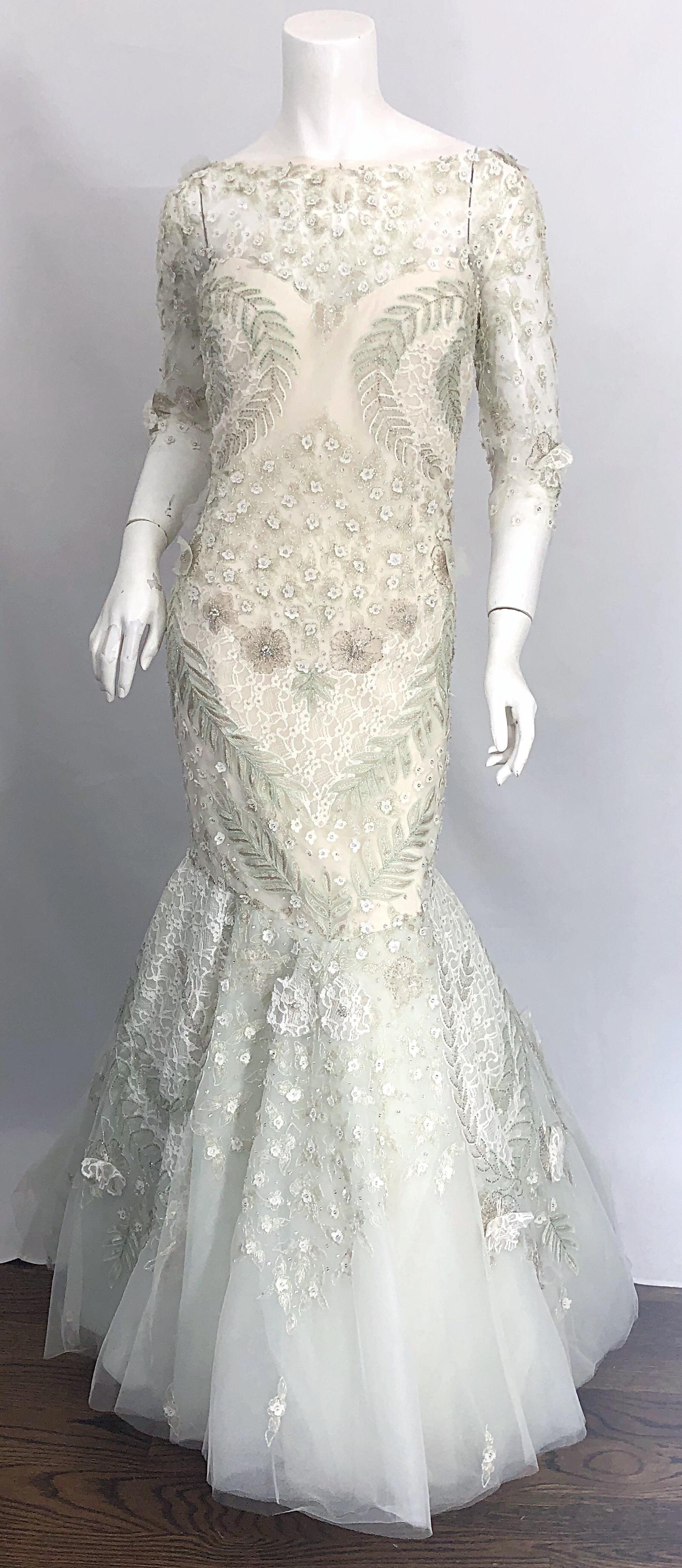 Enchanting MONIQUE LHUILLIER light mint green and ivory beaded, sequined, rhinestone, etc. silk and tulle mermaid gown! This beauty only had one owner, and retailed for over $15,000 when purchased. Entirely hand made, with thousands of hand-sewn
