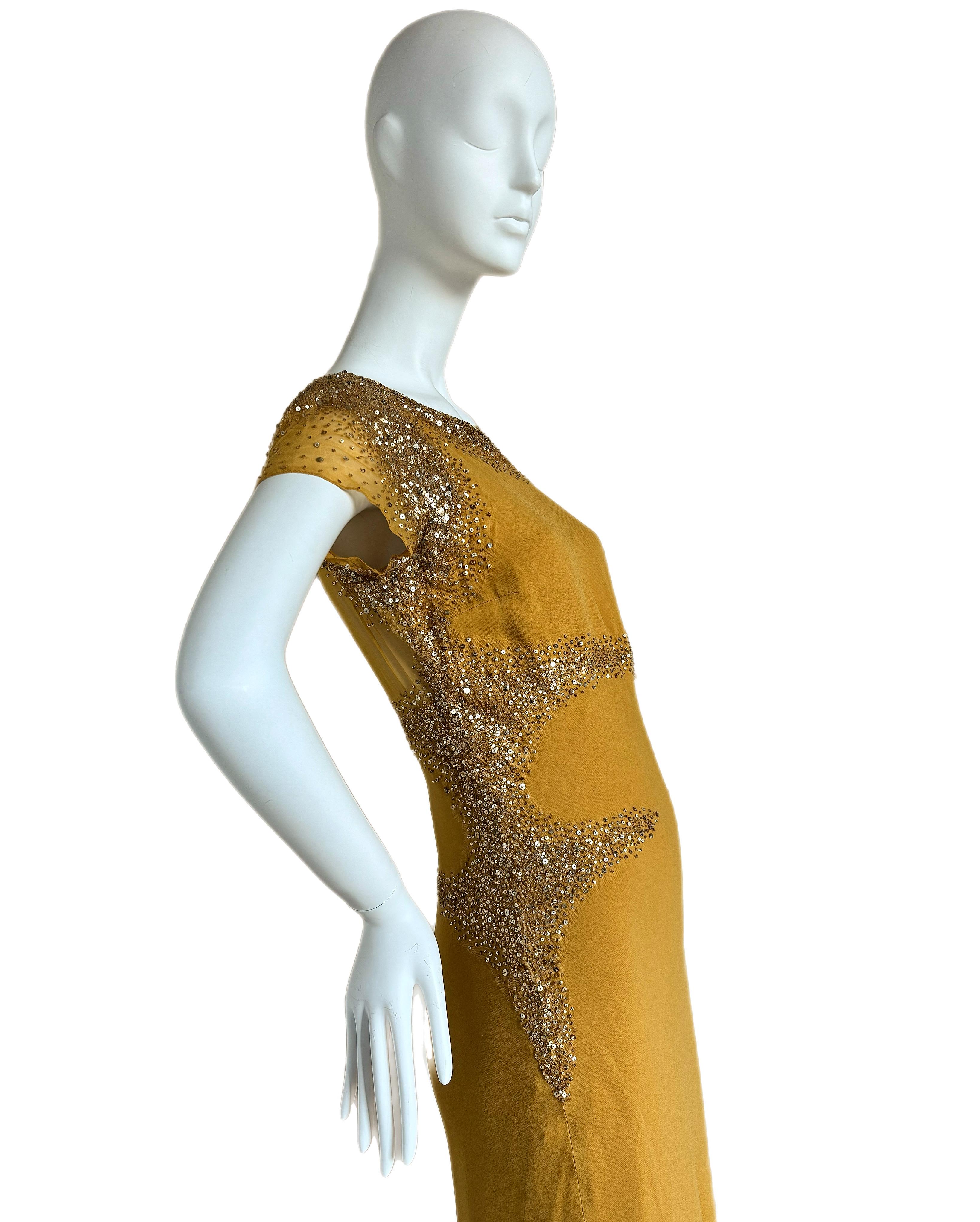 Monique Lhuillier
Vintage
Mustard Yellow
100% silk
Sheer back panel
Size USA 12
Excellent Condition, no flaws, inevitably missing a bead here or there
Measurements in inches laying flat: length 59, pit to pit 17 to 18, waist 15 to 16, hips 17

FINAL
