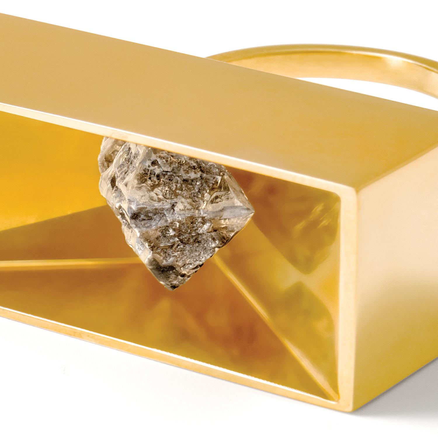 3.99 carat grey semi-transparent rough diamond vessel ring, 18 carat recycled yellow gold, 3.99 TCW

A 3.99 carat grey semi-transparent rough diamond is highlighted within in a geometric vessel of 18 carat recycled yellow gold. 

High polish finish