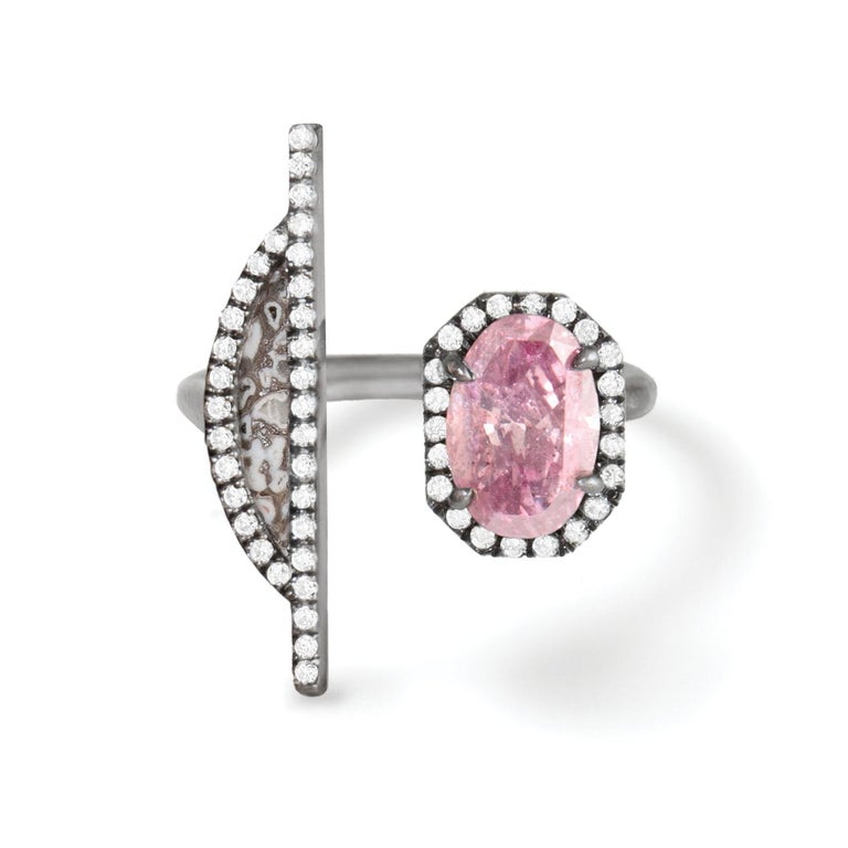 0.80 carat natural fancy vivid purple-pink oval Modified Brilliant diamond and fossilized dinosaur bone open ring and white diamond pavé, recycled oxidized platinum  - One-of-a-kind

This is a design concept that can be commissioned and customized