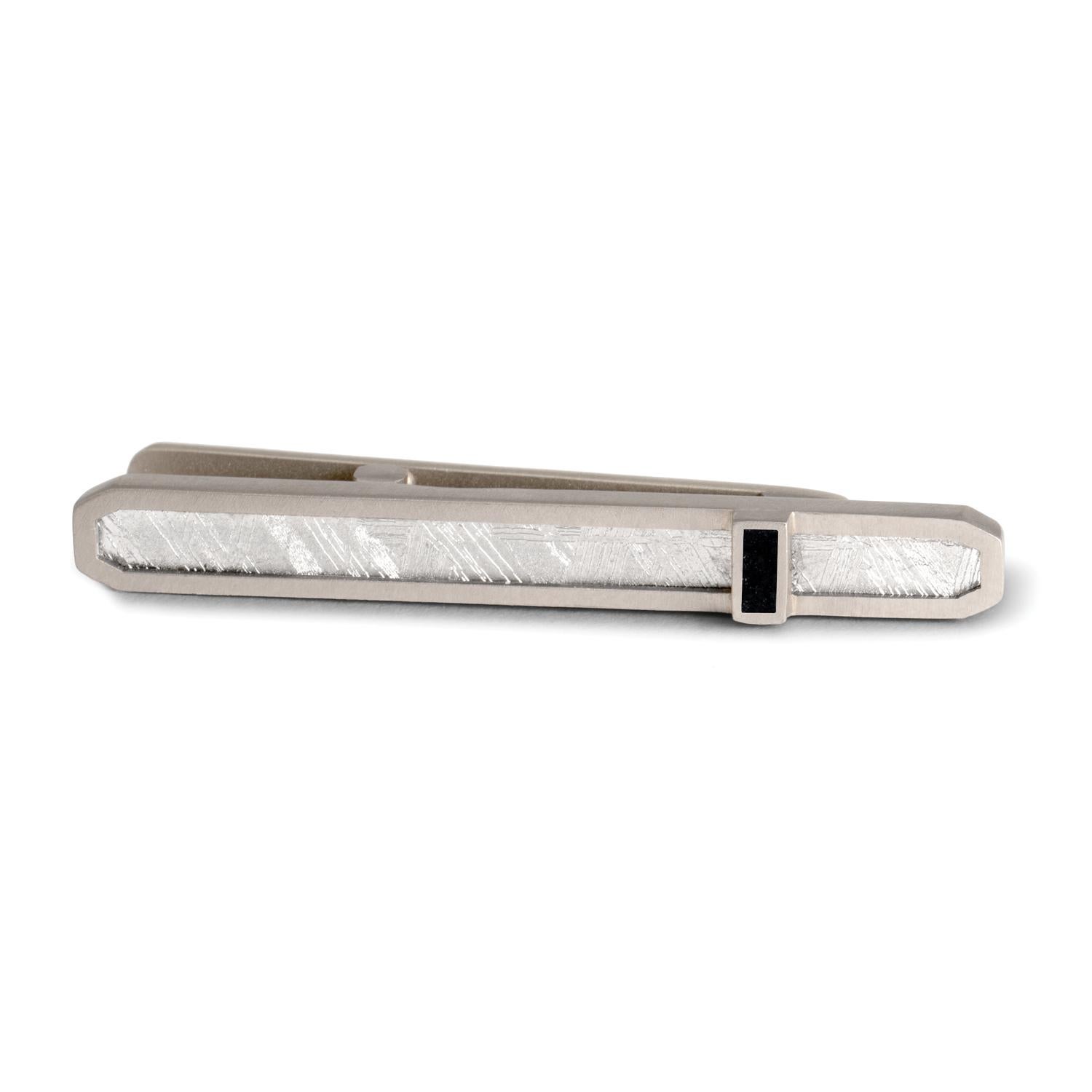 Widmanstätten pattern meteorite slice dimension tie bar with black Guatemalan jade inlay, 18 carat recycled palladium white gold  - One-of-a-kind

Inspired by the intersection of Earth and sky, this tie bar juxtaposes a slice of 4.6 billion year old