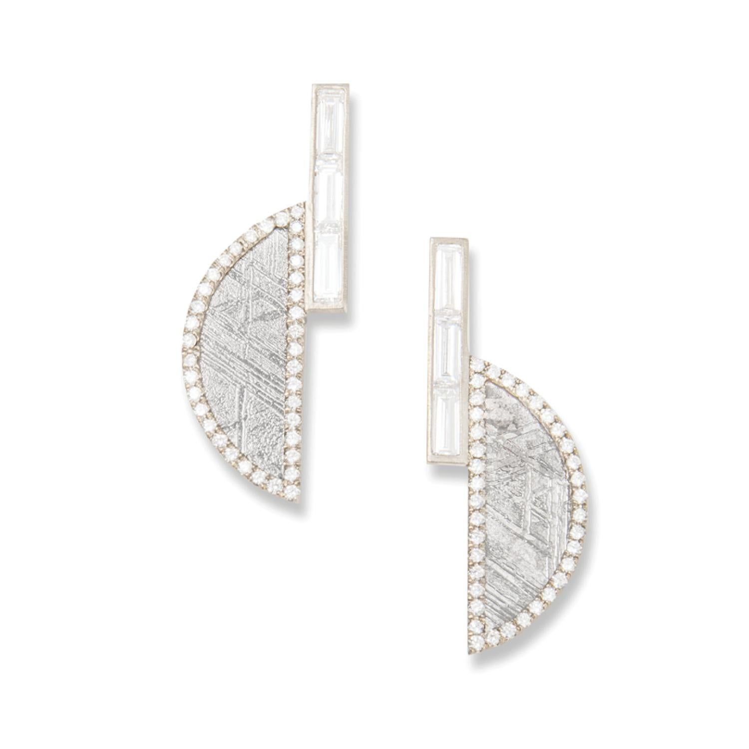 Widmanstätten pattern meteorite slice crescent earrings with white diamond baguettes and white diamond pavé, 18 carat recycled white gold, 0.63 TCW  - One-of-a-kind

Inspired by the intersection of Earth and cosmos, crescents of 4.6 billion year old