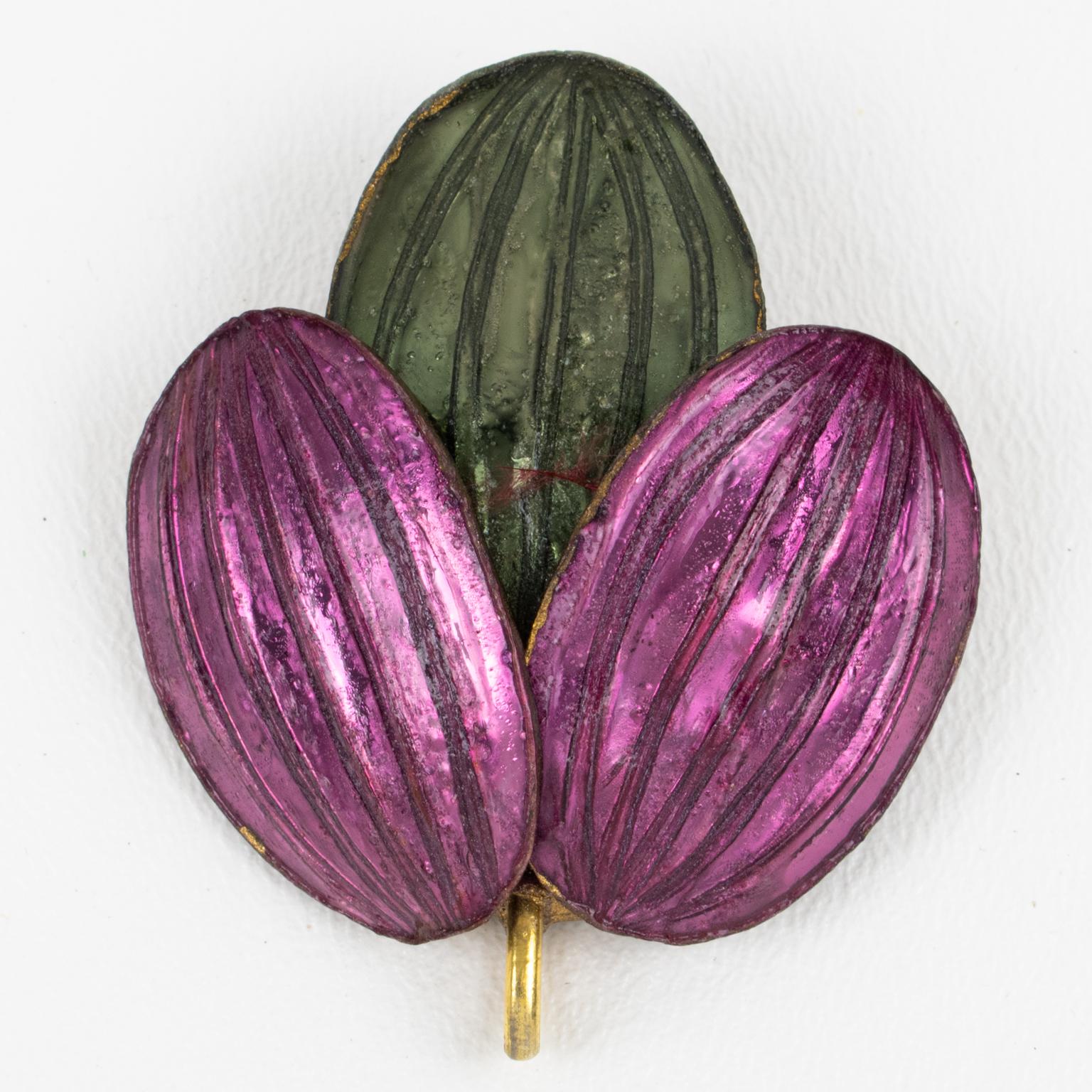 Lovely Monique Vedie Talosel or resin pin brooch. Featuring a stylized dimensional flower shape in pearlized purple and green colors. Security closing clasp. The brooch can also be used as a pendant necklace, there is a brass hook on the lower side.