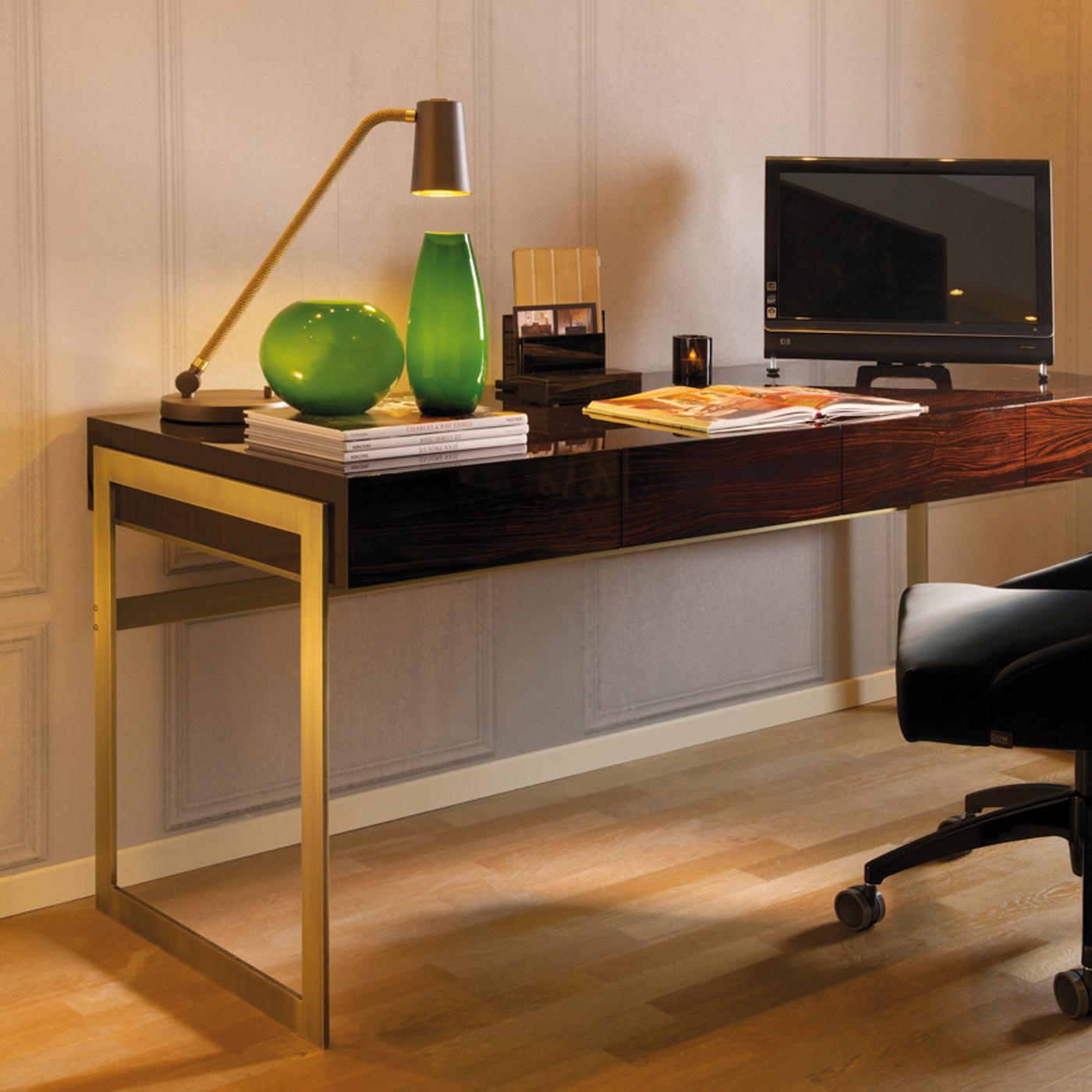 Masterfully handcrafted by expert artisans, this desk combines luxurious materials with a minimalist design aesthetic that will add timeless elegance to any home or office. Evoking a feeling of visual lightness, the rectangular Macassar