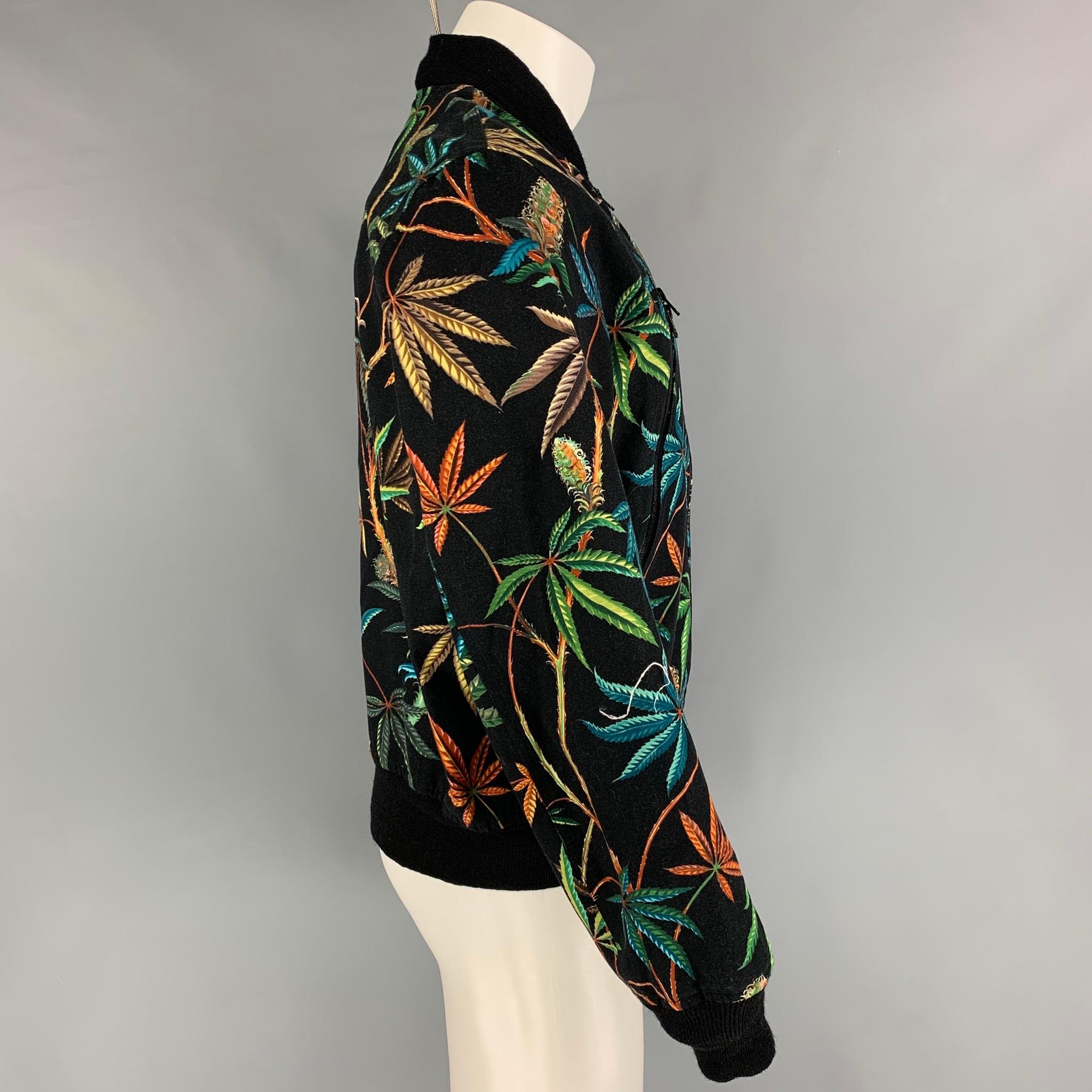 MONITALY jacket comes in a multi-color print cotton featuring a bomber style, ribbed hem, front zipper pockets, and a full zip up closure. Made in USA. 

New With Tags. 
Marked: 40
Original Retail Price: $450.00

Measurements:

Shoulder: 18