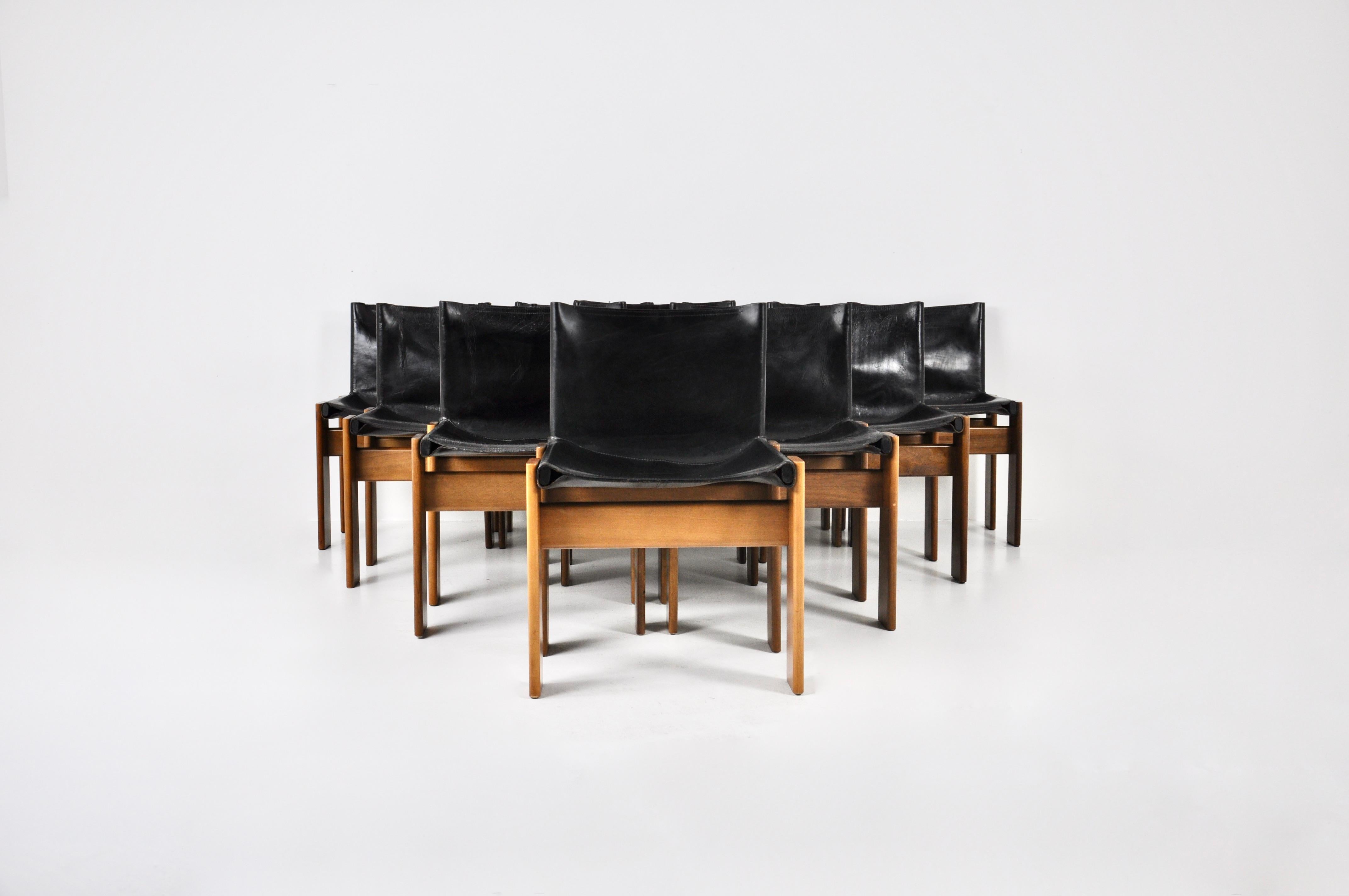 Set of 10 chairs in black leather and wood designed by Afra & Tobia Scarpa. Model: Monk. Seat height: 41cm Wear due to time and age of the chairs.
 