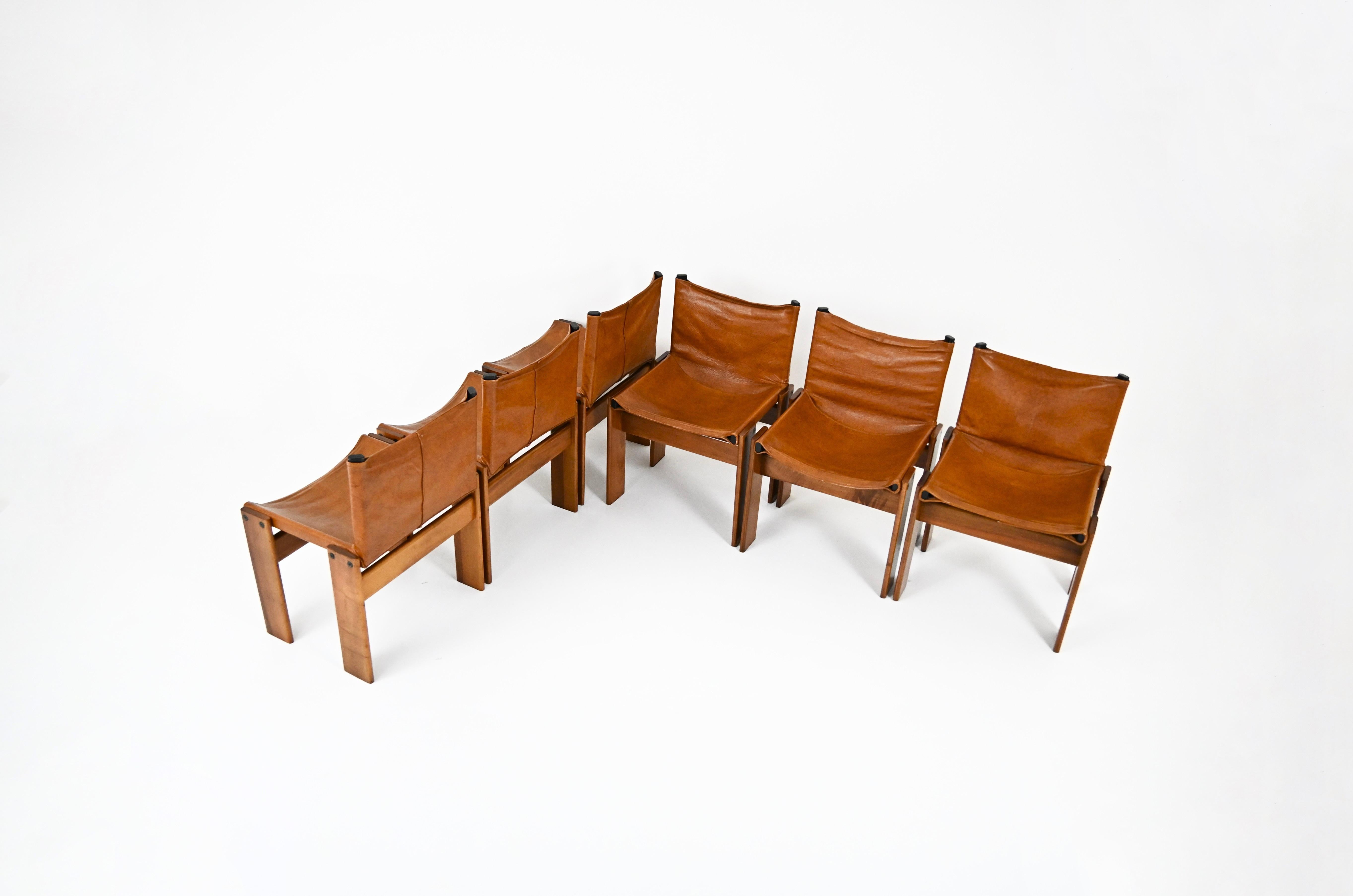 Set of 6 chairs in brown leather and wood designed by Afra & Tobia Scarpa. Model: Monk. Seat height: 42cm Wear due to time and age of the chairs.
FOR SHIPPING, REQUEST US FOR RECEIVE THE BEST PRICE

 