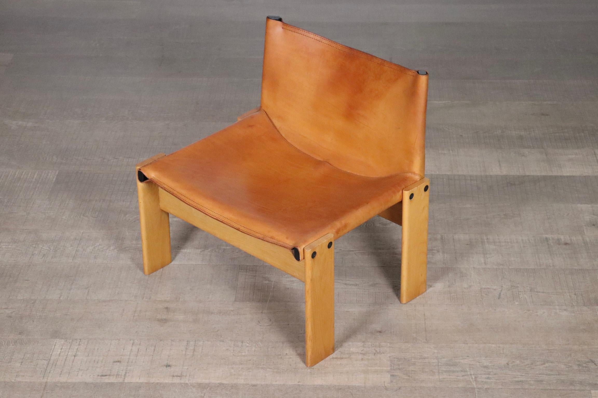 Discover the timeless elegance of the ‘Monk’ lounge chair, an iconic design by celebrated Italian duo Afra & Tobia Scarpa for Molteni in 1974. This rare collectible is highly sought after, with only a limited number ever produced.

The chair