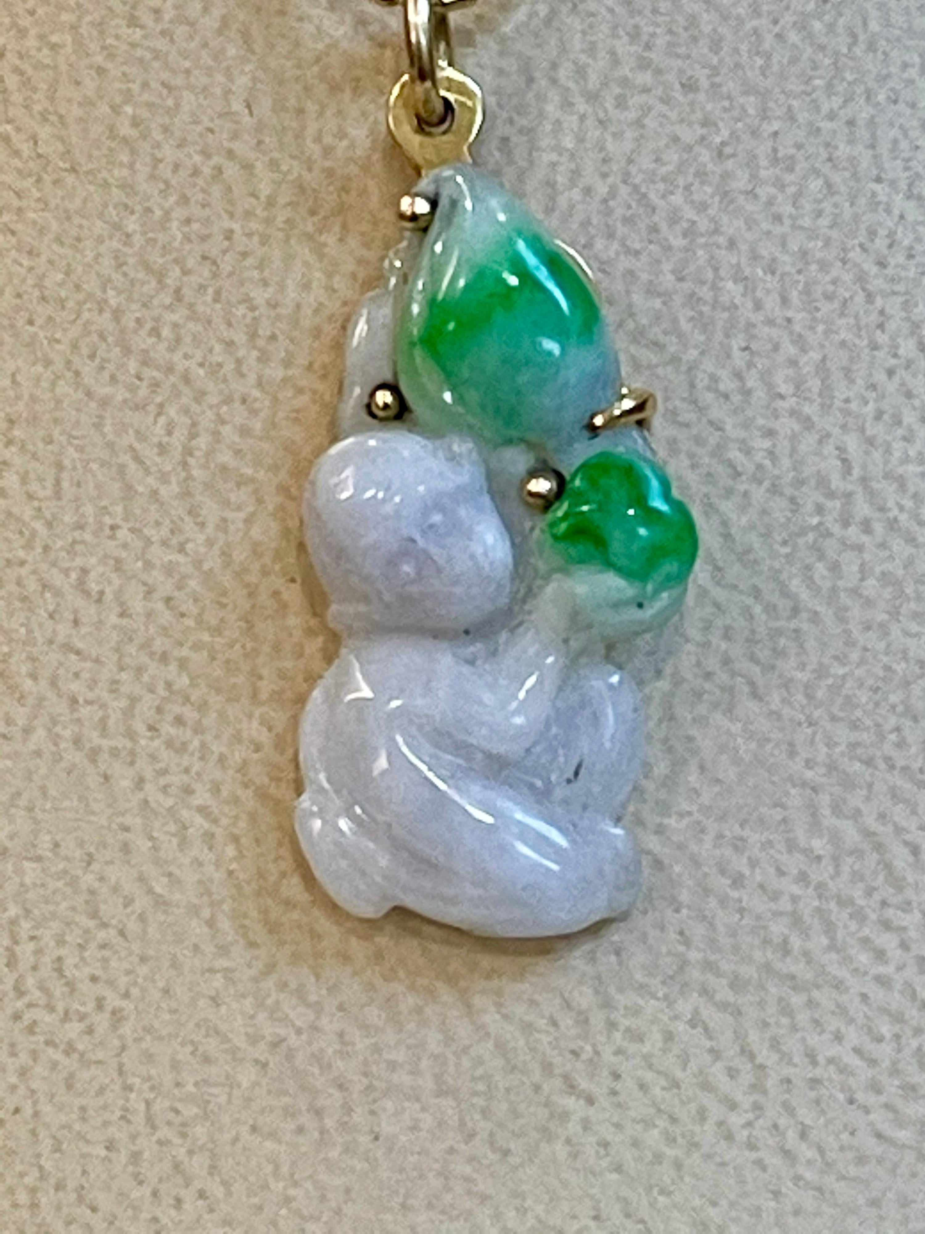 Monkey Face Natural Jade Pendant  Chain Necklace  14 Karat Yellow Gold  Vintage
This spectacular Pendant Necklace  consisting of a single stone of jade , a small monkey  in white and green Jade.
18 Karat   gold  5.4 Grams with Jade
The pendant comes