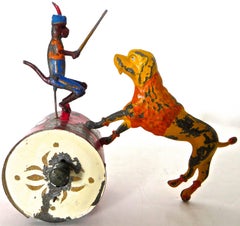 "Monkey on Drum Training a Dog" Tin Toy, circa 1885