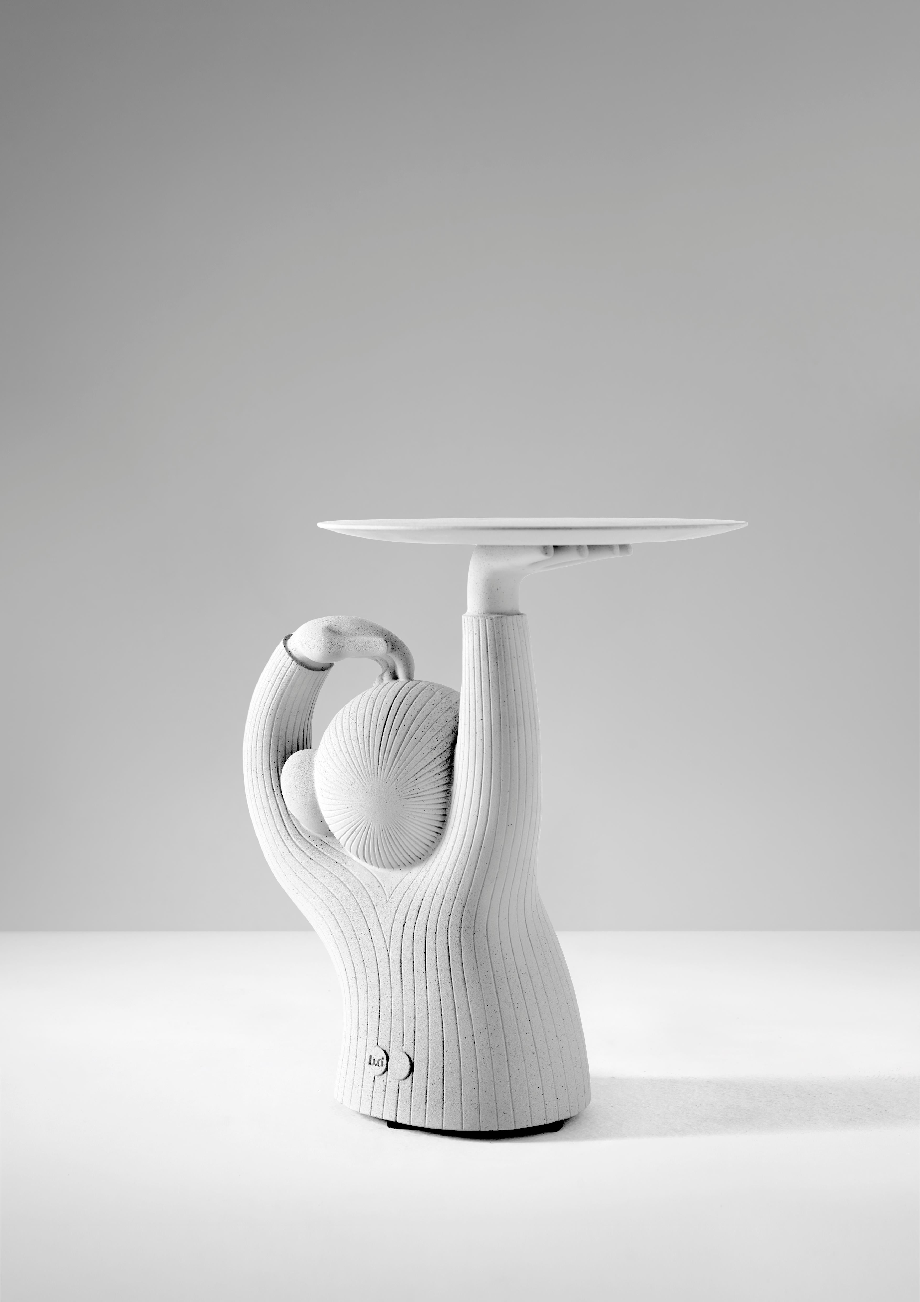 Side table made of solid architectural concrete in white. Apt for indoor and outdoor use. Regulatory glides included.
Few pieces have achieved bestseller success and simultaneous publishing as this singular side table by Jaime Hayon. It is