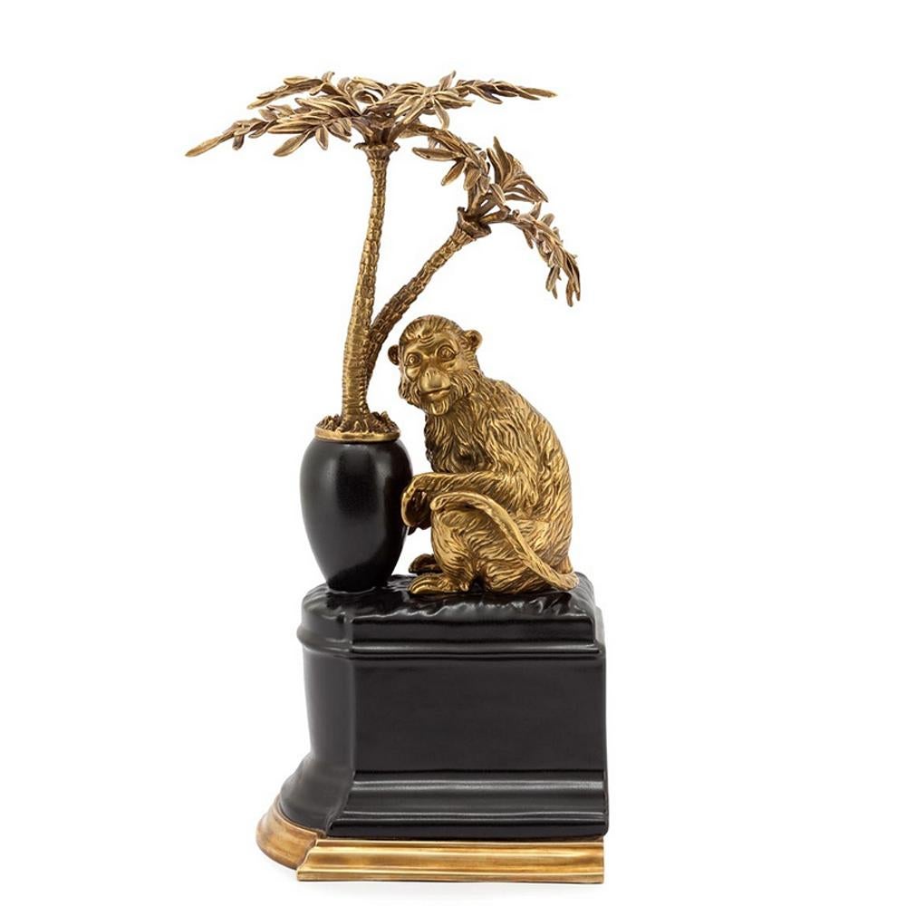 Bookends monkeys and palms set of 2 in
solid bronze and with base in hand painted
porcelain. Measures: L 17 x D 17 x H 33cm each piece.