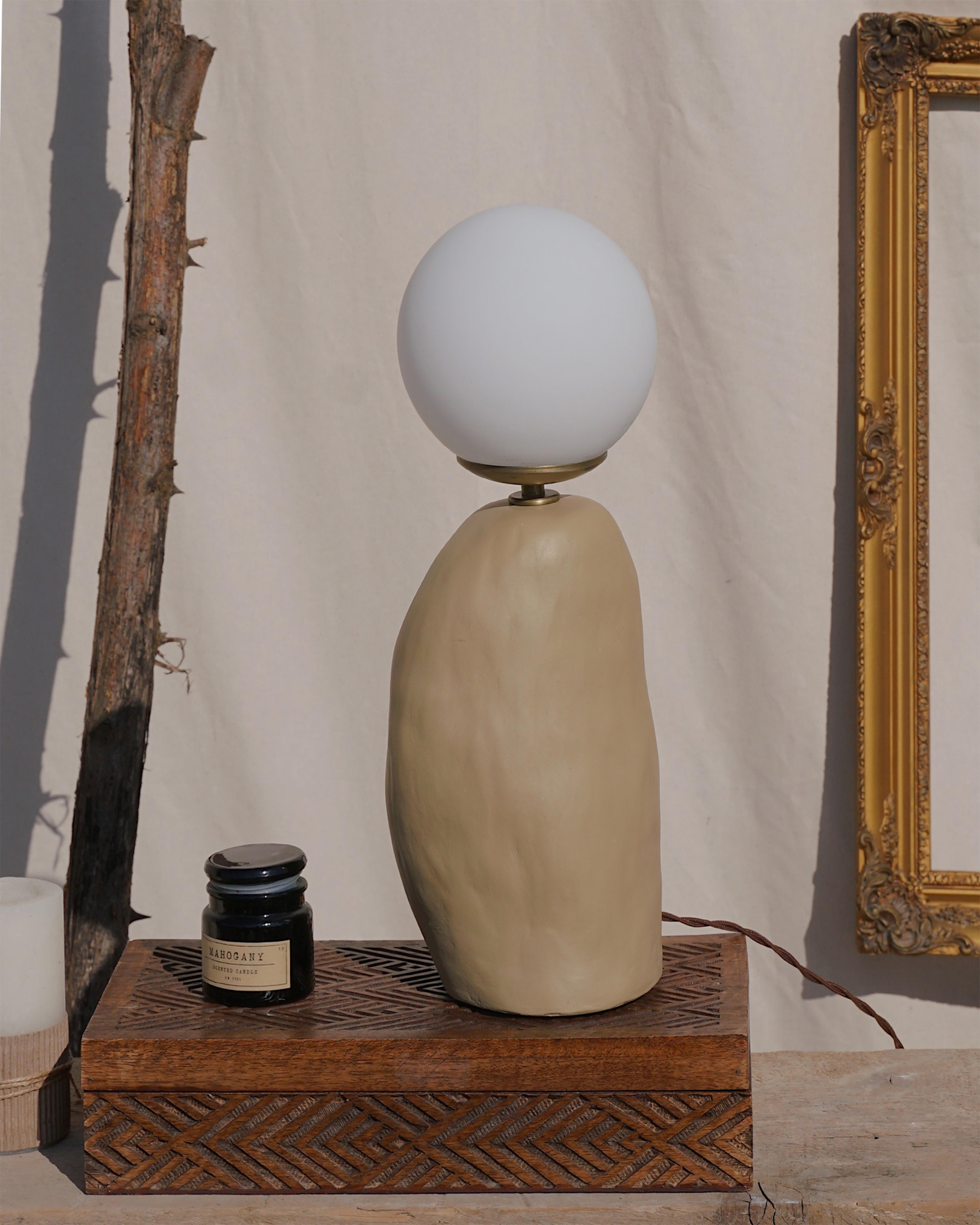 Mono Table Lamp by Tuğçe Geyik
Limited Edition
Dimensions: Ø 15 x H 45cm. 
Materials: Polyester.

Available in White and Beige. All our lamps can be wired according to each country. If sold to the USA it will be wired for the USA for instance.