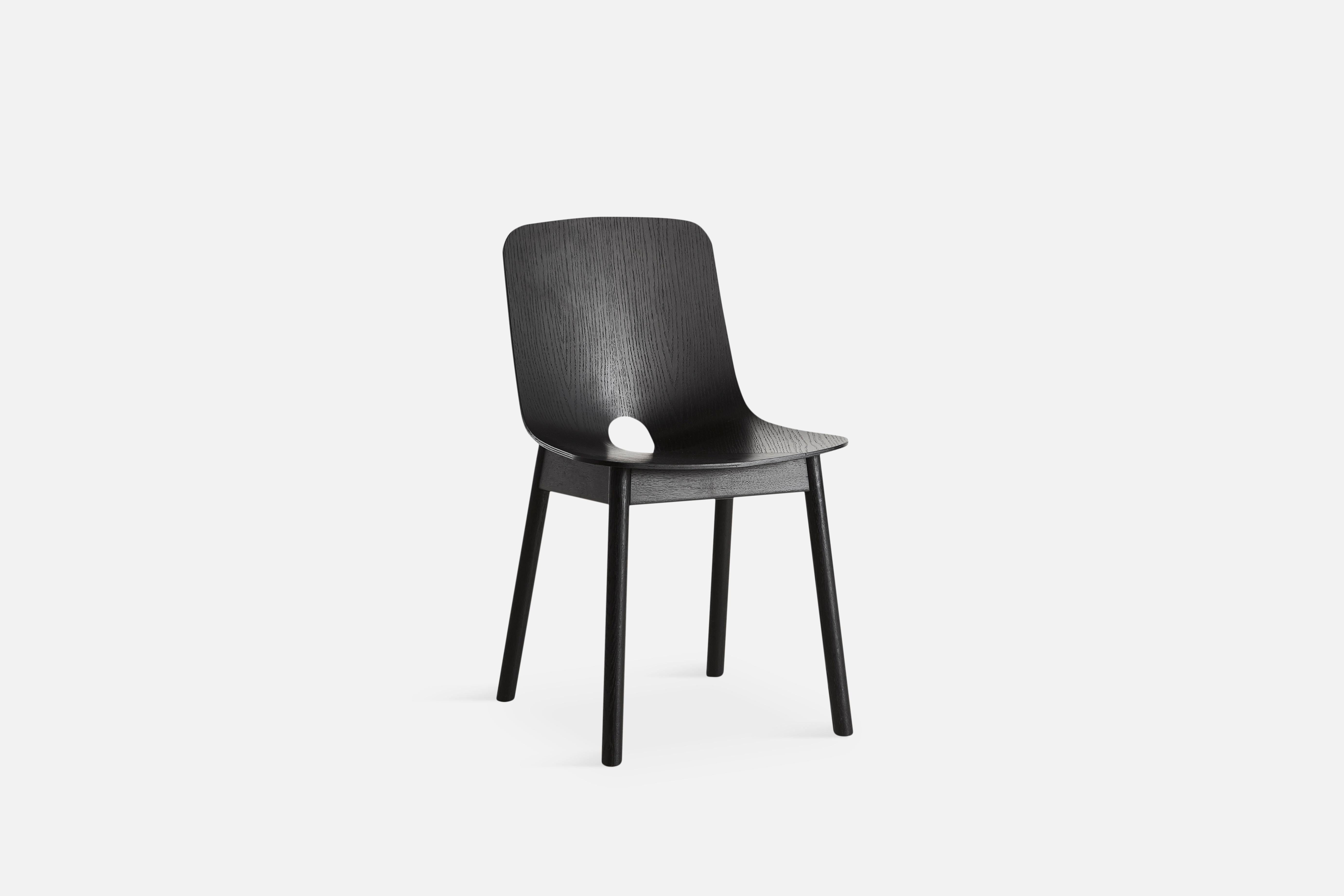 Mono black dining chair by Kasper Nyman
Materials: Solid Oak, Oak Venner
Dimensions: D 51 x W 45 x H 78 cm

Woud
The founders, Mia and Torben Koed, decided to put their 30 years of experience into a new project. It was time for a change and a