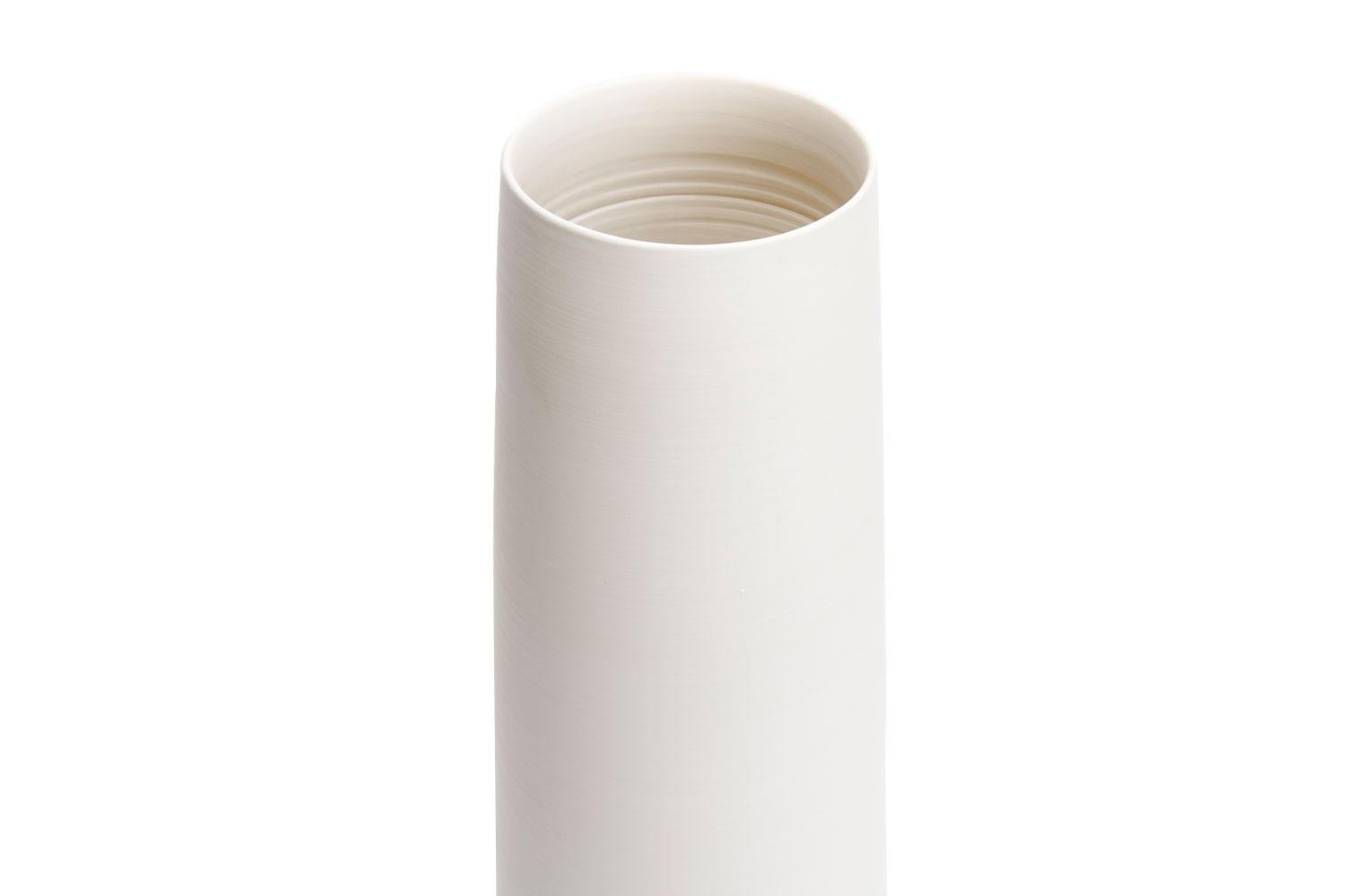 White handmade vase, Rina Menardi

White ceramic vessel is handmade in Italy and from Rina Menardi.

Rina Menardi’s collections are a fusion of art, design and craftsmanship, where chromatism, aesthetics and functionality converge in a synthesis