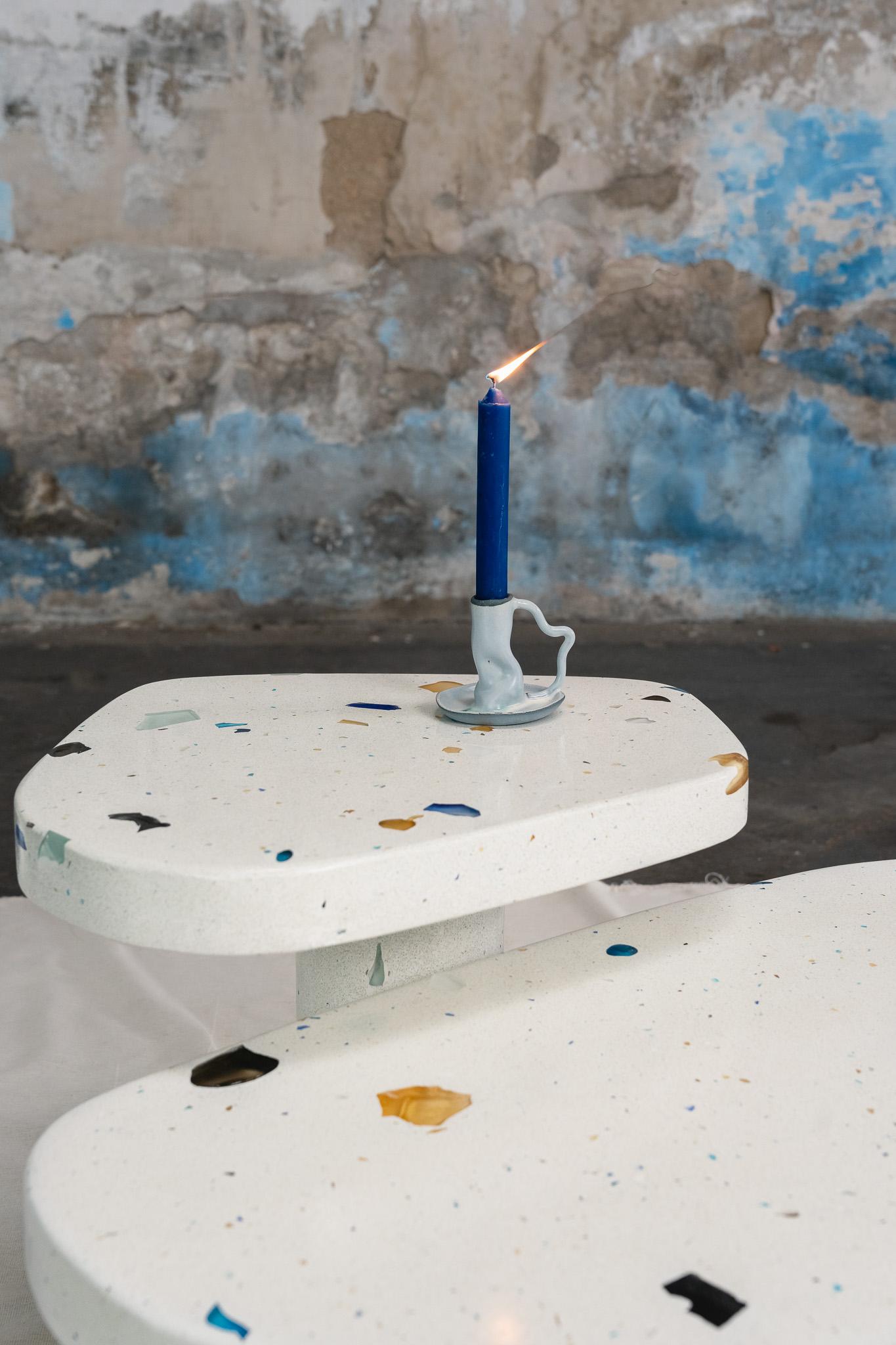The Mono Side Table takes part of the MONOMORFO collection. It has an amorphous top with 4 possible variations of shape. The terrazzo composition is made of leftover glass crystals from a glass crystal factory in Minas Gerais, Brazil. This leftover