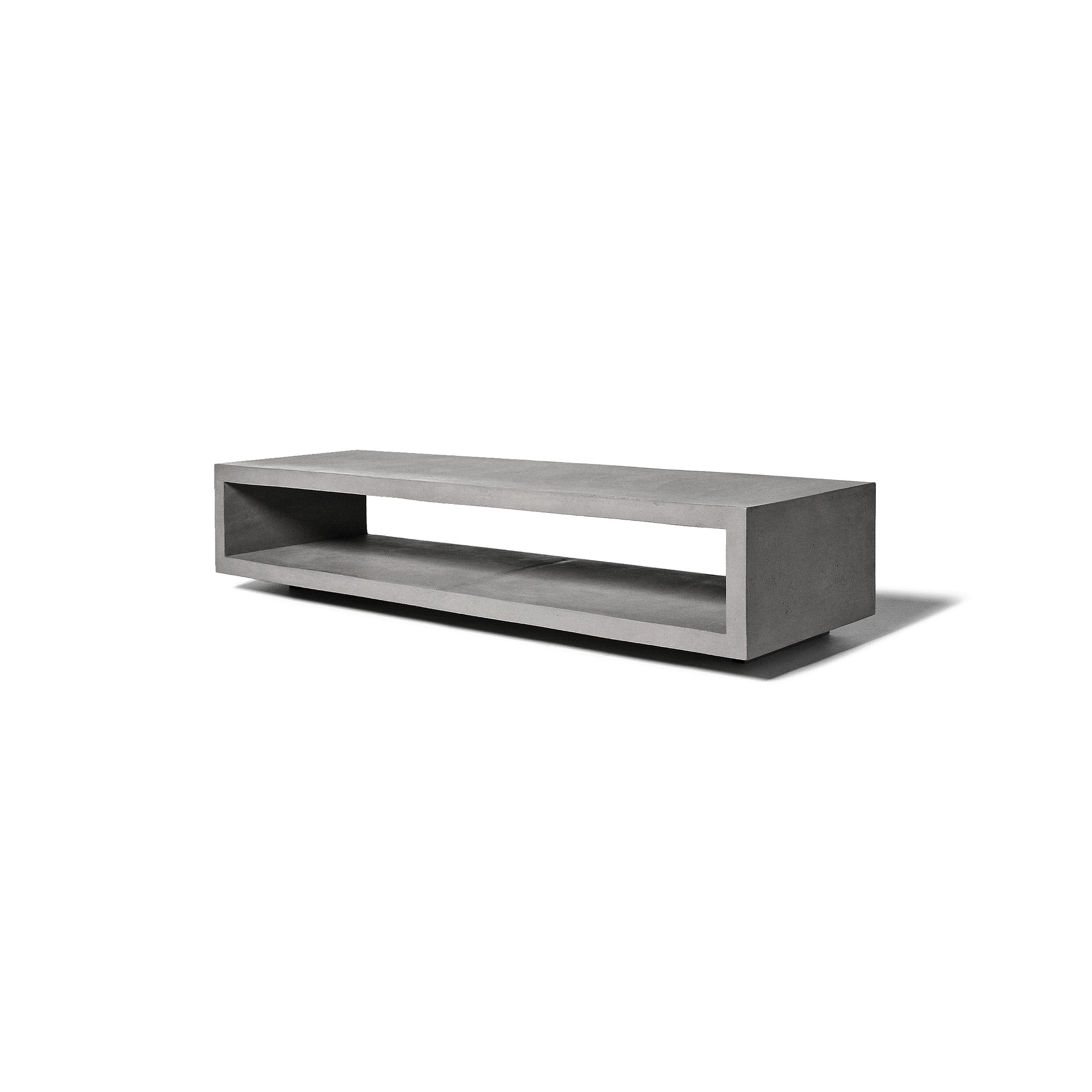 The Concrete Monobloc TV bench designed by Lyon Béton floats beautifully above the ground and is specially designed to accomodate your flat screen TV. Characterized by its clean lines, its straightforward geometric configuration, its simplistic