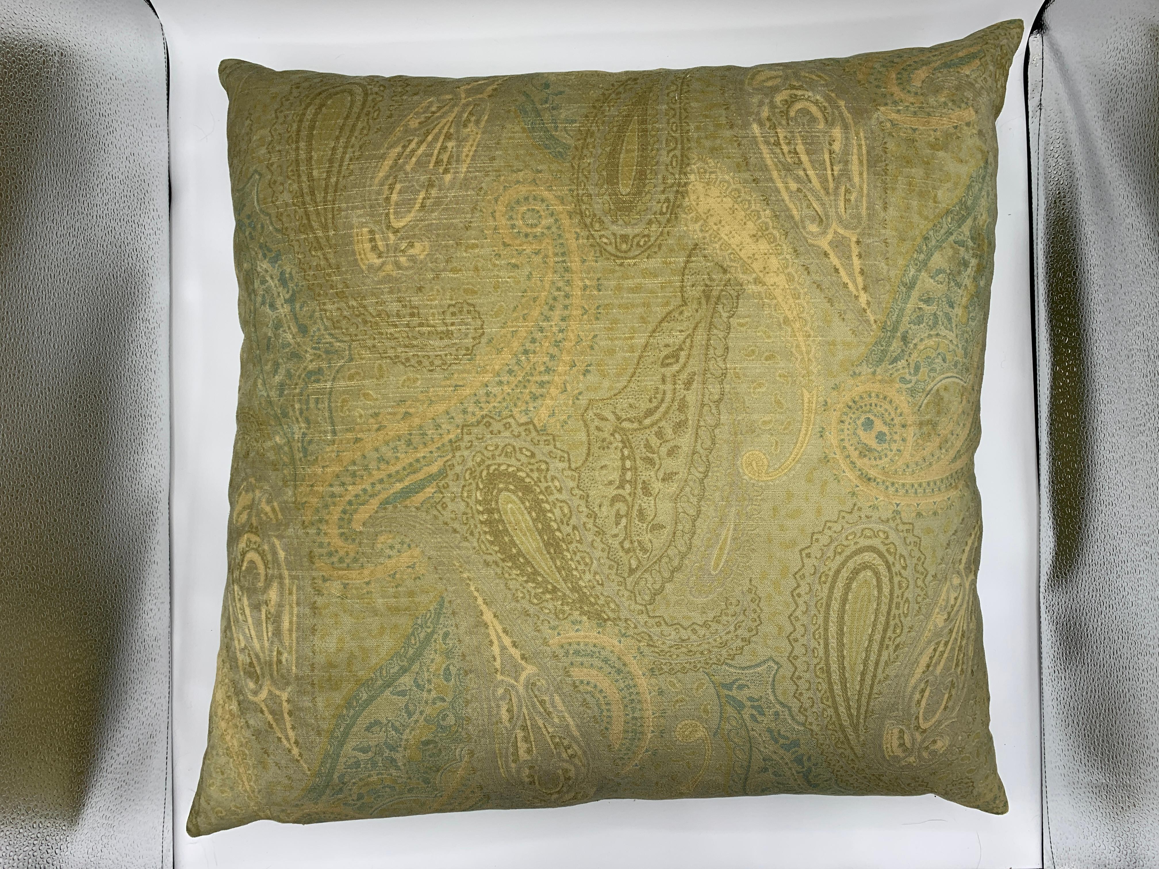 Listed is a stunning, pair of oversized, velvet pillows. The pair has a beautiful, tone on tone green paisley motif allover. Down insert and zipper closure in each. Euro sized, 28in x 28in each.